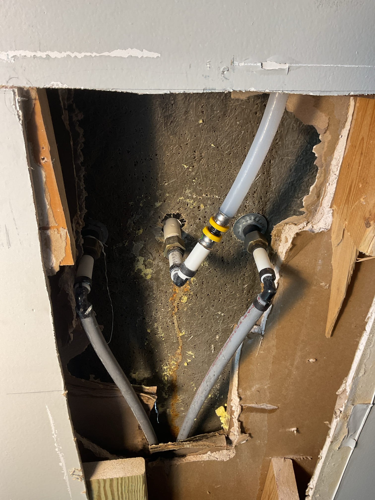 Upon arrival customer had a leak in their wall and a leaking sillcock. Tech removed old sillcock and disposed of it. Tech installed new frost free sillcock and used silicone on the back of the sillcock to seal the hole. 

-Tech then cut through the back of the wall to access leak. Tech found that water was coming from the shower arm. Tech removed shower arm and adapter going into shower arm. Tech then installed a drop ear 90 and adapted it to pex. No leaks present at time of service. 

-Tech caulked bottom of shower as a courtesy 