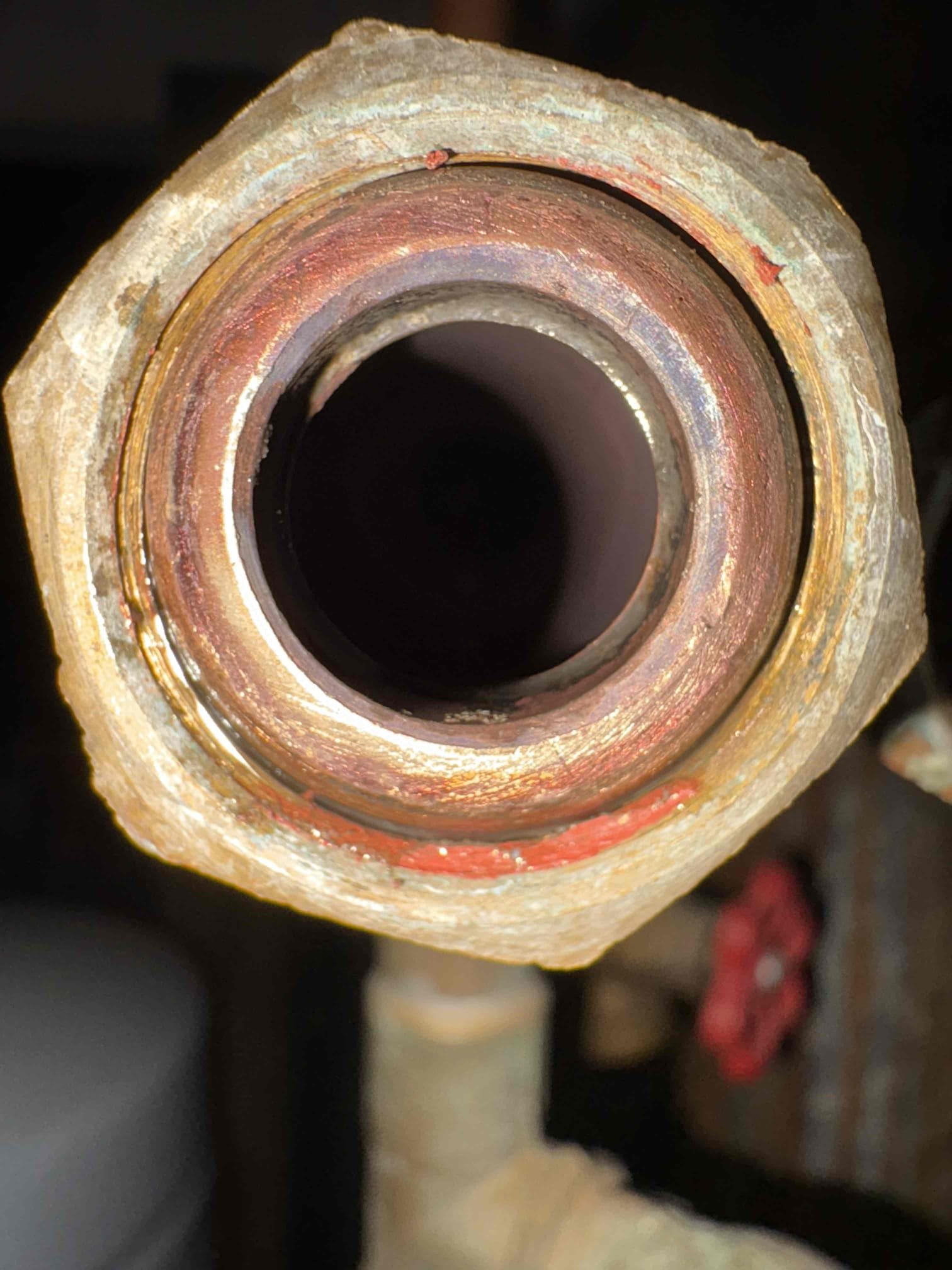 Arrived on site for a report of no hot water. Upon arrival, Jonathon explained the history of the unit and noted that multiple flat plate heat exchangers have been replaced over the past few years.

Based on my initial evaluation, I suspected that the flat plate heat exchanger was plugged and restricting water flow on the domestic side. I removed the flat plate and found a significant amount of buildup inside. Testing confirmed that the domestic side of the heat exchanger was completely restricted.

With customer approval, I replaced the flat plate heat exchanger, purged air from the system, and confirmed proper operation.

The best course of action moving forward is to have one of our plumbers come out to assess and install appropriate filtration or water treatment options to prevent future buildup and damage to system components.

System is operating properly at this time.
