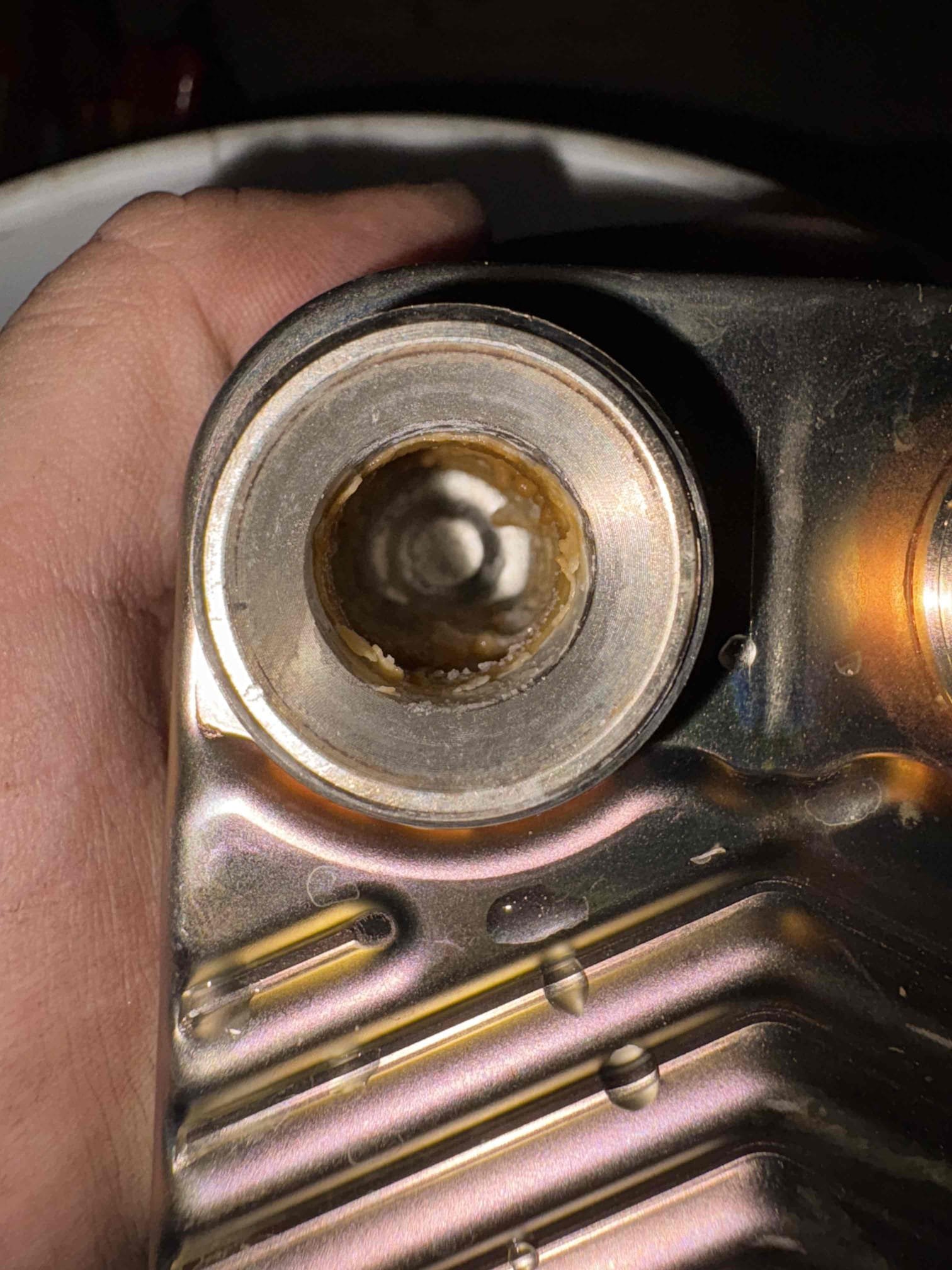 Arrived on site for a report of no hot water. Upon arrival, Jonathon explained the history of the unit and noted that multiple flat plate heat exchangers have been replaced over the past few years.

Based on my initial evaluation, I suspected that the flat plate heat exchanger was plugged and restricting water flow on the domestic side. I removed the flat plate and found a significant amount of buildup inside. Testing confirmed that the domestic side of the heat exchanger was completely restricted.

With customer approval, I replaced the flat plate heat exchanger, purged air from the system, and confirmed proper operation.

The best course of action moving forward is to have one of our plumbers come out to assess and install appropriate filtration or water treatment options to prevent future buildup and damage to system components.

System is operating properly at this time.
