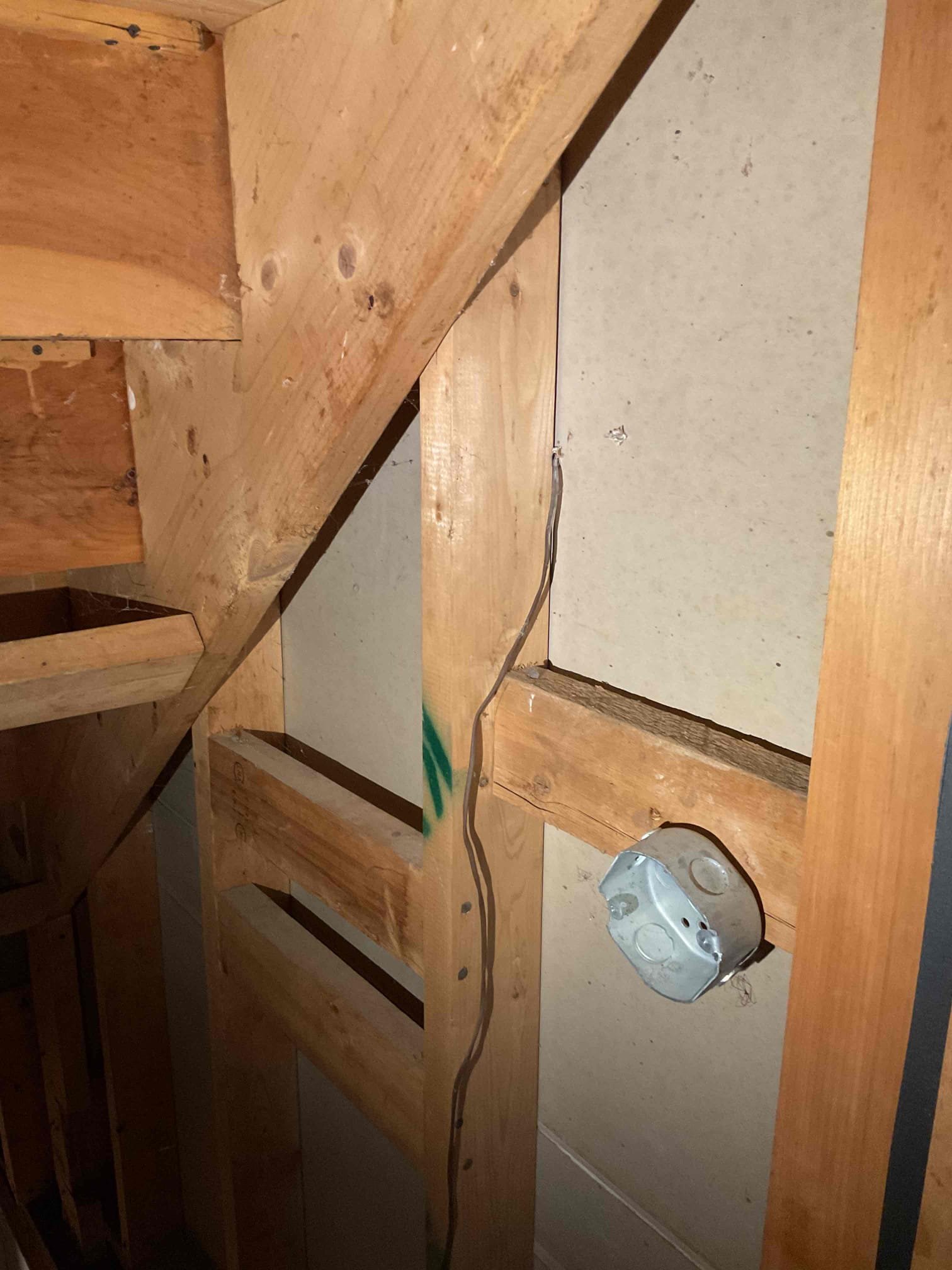 Responded to a report that the furnace blower fan would not turn on when manually activated at the thermostat. Upon inspection, found that the thermostat was wired with only a two-conductor cable, which does not support independent fan control. With approval, replaced the thermostat wire between the furnace and thermostat with a six-conductor cable. Secured the new wire along the existing Romex and fastened it to the wall for proper support. Tested operation and confirmed that the blower fan now turns on and off correctly when controlled from the thermostat and operates automatically with the burner as intended. 
Identified a minor oil leak at the oil tank filter assembly and tightened both the filter nut and bleeder nut to stop the leak. 