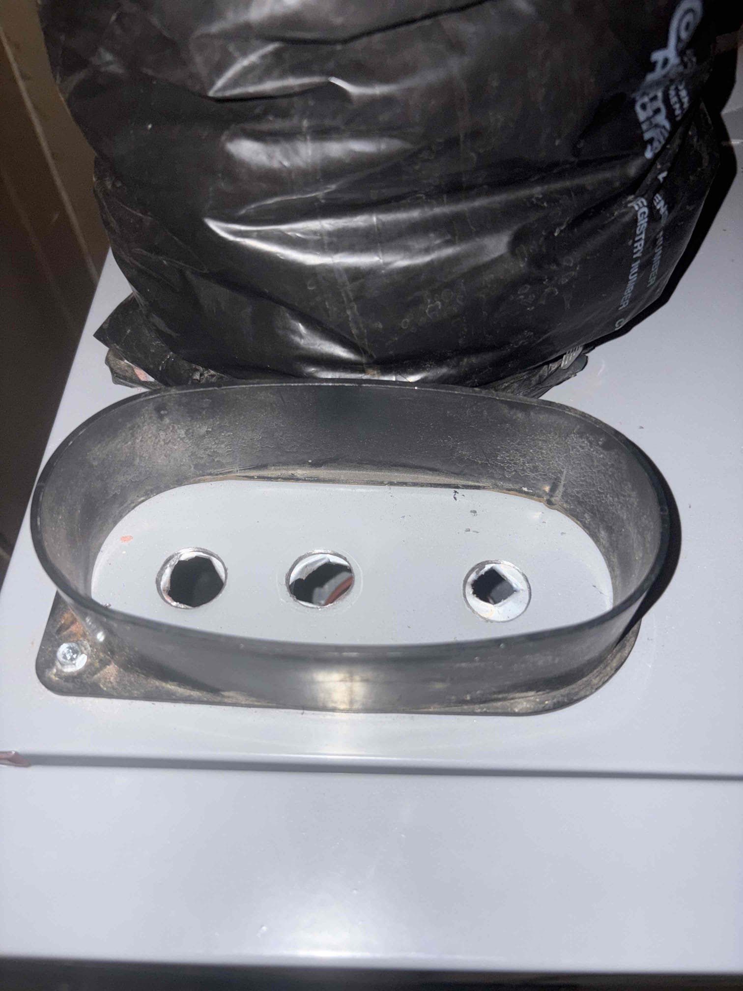 Responded to a report of a whistling noise coming from Sheryl’s recently installed Thermo Pride furnace. The homeowner reported that the noise occurred during operation, typically when the system first started, but not consistently or at any specific time of day. I began by inspecting the blower fan and burner components; all were secure, and I was unable to recreate the noise initially. I adjusted the blower fan speed and retested the system. When I partially obstructed the front face of the furnace, I was able to reproduce the whistling noise.

Upon further inspection, I found three small holes drilled in the top of the furnace for fresh air intake. When I covered one of the holes with tin tape, the noise increased in volume. I then drilled two additional larger holes in the intake and enlarged the existing ones to improve airflow. After reconnecting the air intake and running the system continuously, I was unable to recreate the whistling noise. I believe the issue was caused by the