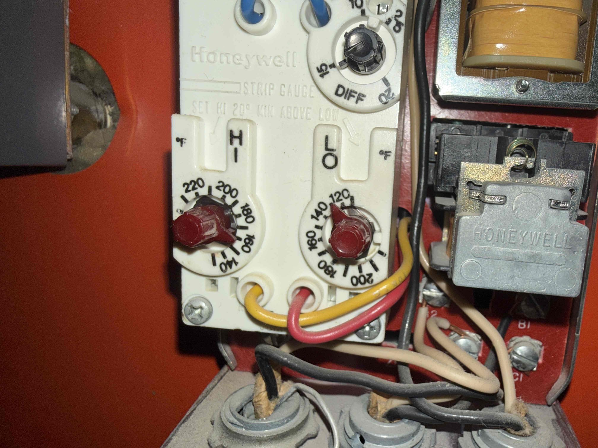 Customer reported that the relief valve on their oil/wood boiler was discharging. Upon inspection, we operated the boiler to its high limit and observed that the relief valve did not discharge during testing; however, there was evidence of prior discharge, as water was present in the bucket beneath the valve. Boiler pressure was found to be at 25 PSI.

Checked the expansion tank and determined that it has failed, leaving no room for system expansion as the boiler heats, which likely caused the relief valve to release. Presented the customer with estimates for replacement of the expansion tank and relief valve, as well as the addition of a drip leg to the relief valve outlet for safety.

We are scheduled to return in the morning to perform the recommended repairs. For the interim, the aquastat was turned down to 160°F to limit boiler temperature overnight. The customer has been advised that if the supply zone shutoff valve leaks when closed during service, an additional estimate will be