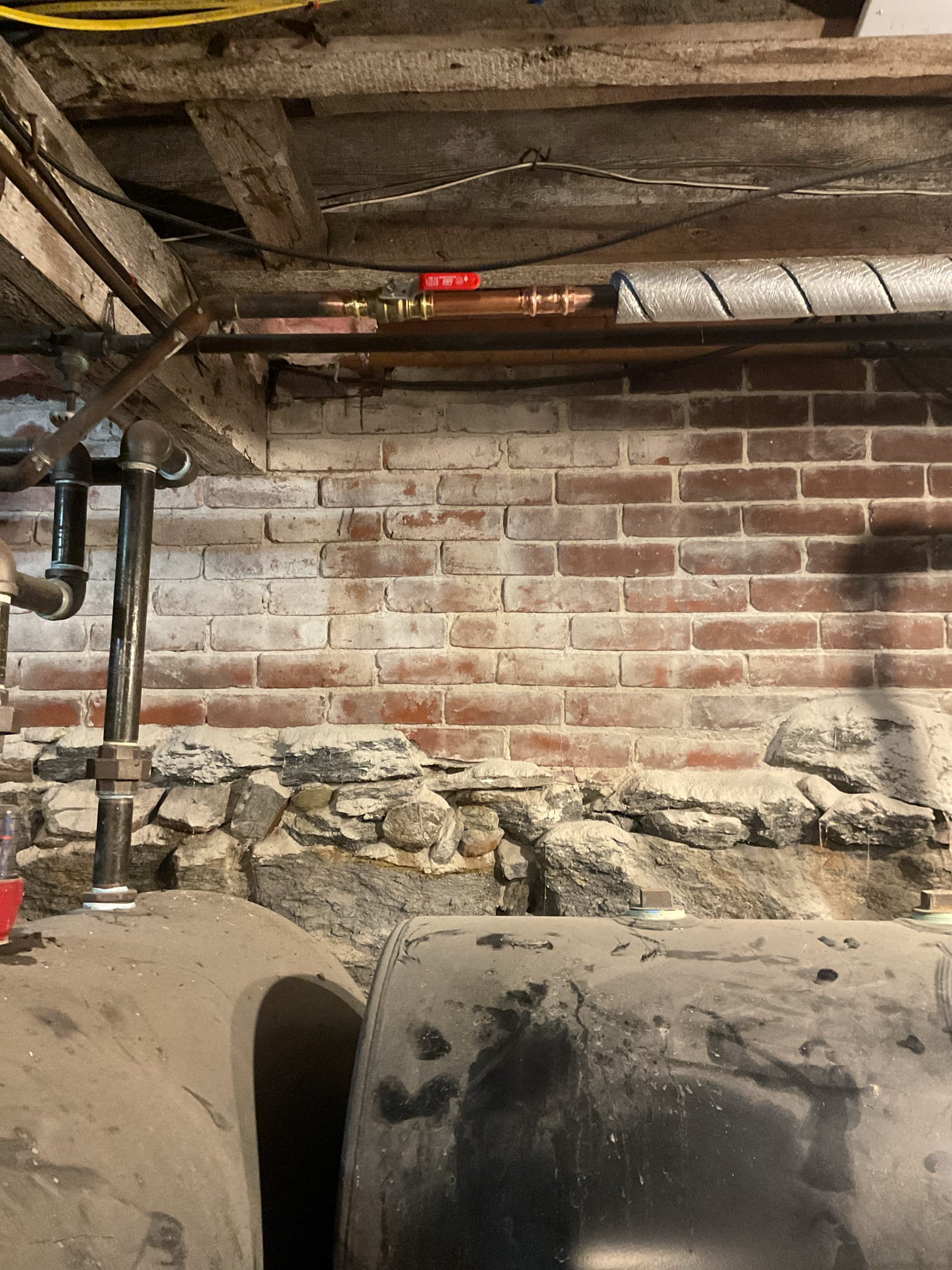 Installed new 50 gallon Rheem electric water heater with mixing valve and st12 thermal expansion tank. Repiped a majority of hot water due to it cross connections between cold and hot that had been previously valved off and are no properly separate. Added several hangers on entire system due to lack there of any. Turned thermostats to 150° and set mixing valve to 120° also ran new romex and water tight from a junction box to the water heater. Added a new main water shut off valve and labeled it. 