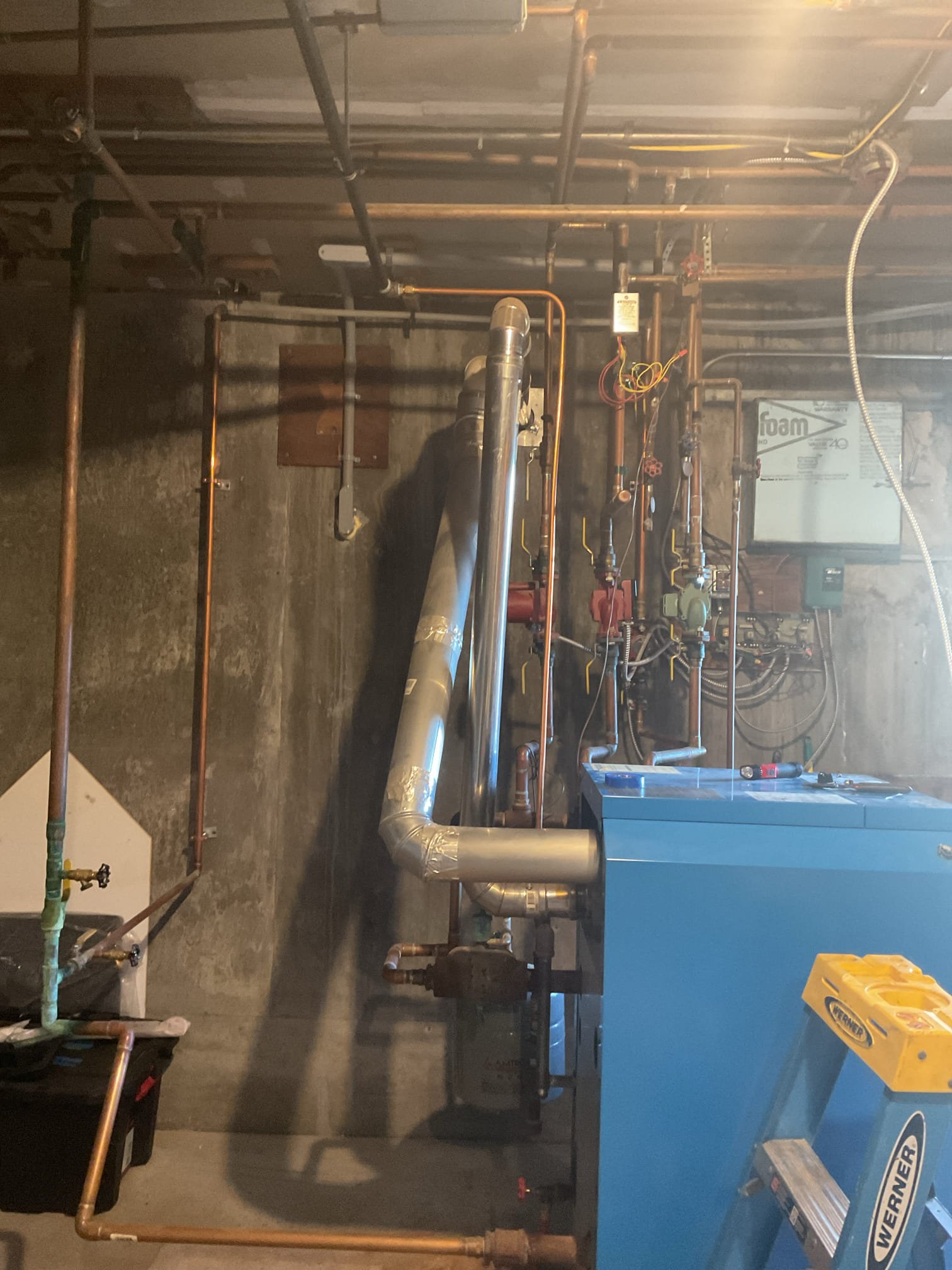 11/04/25 - Arrived on site to replace the existing Buderus propane boiler. We started by turning off power and gas supply to the unit. We then cut the piping close to the ceiling and removed all components not being reused. We removed the old boiler and venting. Hung new backboard and then hung the new boiler. Piped the gas line. Got started on the water piping. Mounted taco zone board. Tomorrow will be mainly water piping.

11/05/25 - Arrived on site to continue return and supply piping. Installed outdoor sensor. Got a plan for the venting. When we return in the morning we plan on getting the rest of the piping done. May need to return Friday to finish up the electrical.

11/06/25 - Arrived on site to finish up water piping. We also ran the venting just need to cut the hole for it. Ran condensate line and installed pump. We will be back in the morning to wire everything up and do startup.