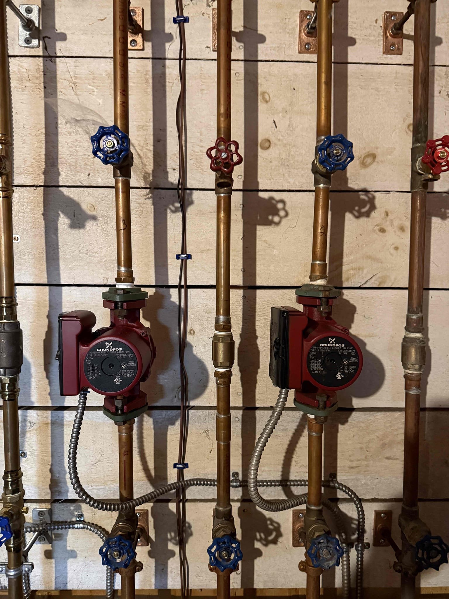 
Removed the existing Ultimate boiler and installed a new Pure Pro oil boiler. The existing supply and return manifolds were retained and connected to the new system using updated piping. Installed a new expansion tank and Spirovent air eliminator to improve system performance and reliability.

Replaced the water feeder, backflow preventer, and two circulator pumps. Connected the new boiler to the existing domestic hot water piping, adding new purge valves, a thermostatic mixing valve, and a scale filter. Installed a new switching relay, reused the existing common wires for the Nest thermostats, and added a dedicated service switch.

Installed new smoke pipe and connected it to the existing chimney with a draft damper. Reconnected the existing oil line using a new flexible connection and Firomatic safety valve. The mixing valve was set to position “3” on the boiler high limit to maintain approximately 115°F at all faucets.

Performed a full system startup, verifying the operation of al