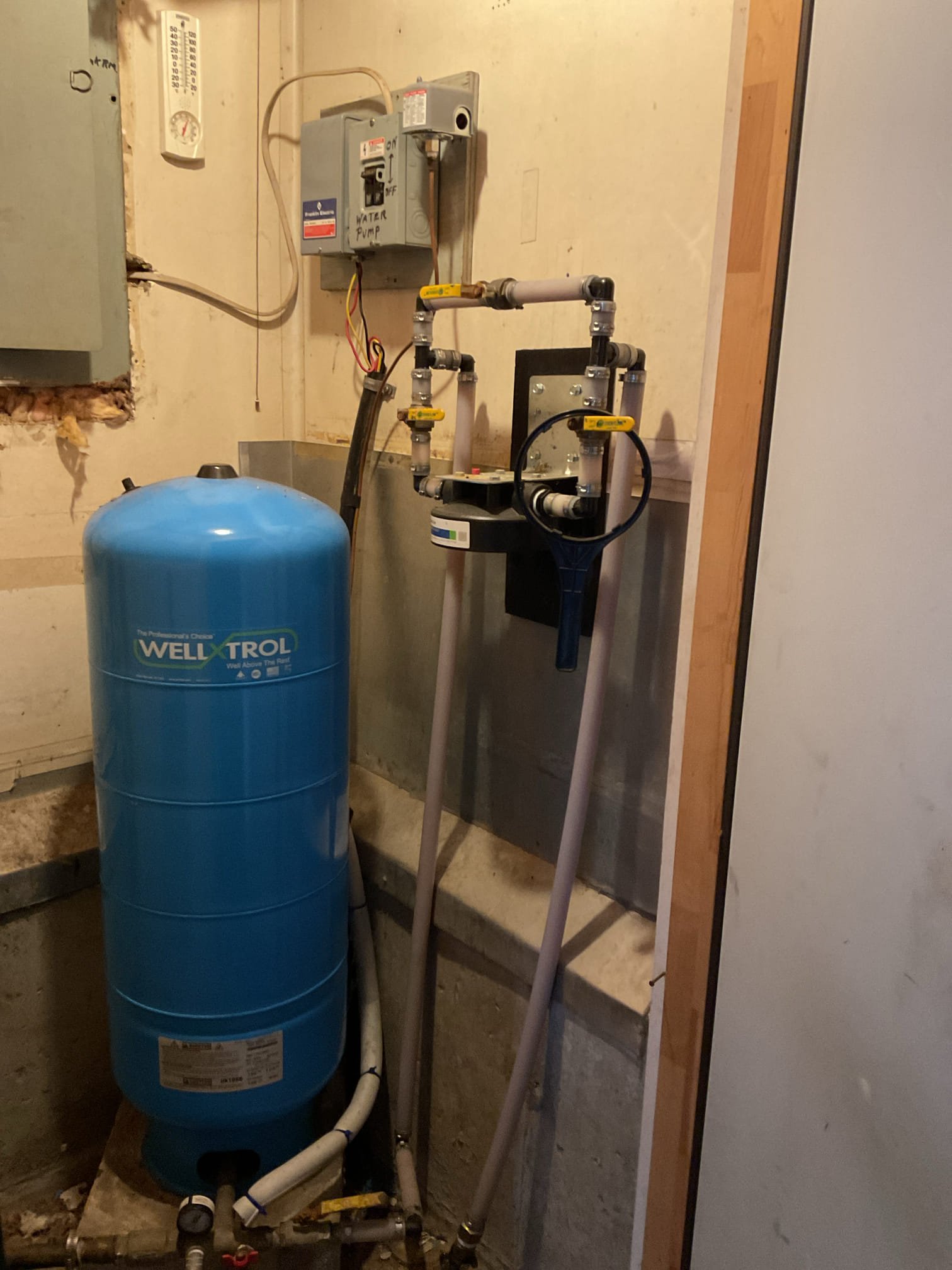 A full diagnostic assessment was performed to determine the source of the leak. Prior to inspection, approximately 1/2" of standing water was extracted from the crawl space; water had been pooling around the leak location and dripping through the insulation near the ductwork. All accessible water was removed and a fan was used to assist with drying; due to the size of the affected area, some residual moisture remained, but the majority was eliminated.
Two sections of 1/2" trailer PEX were found to be leaking due to deterioration and rodent-damaged fittings. The damaged Tee fitting and affected pipe sections were cut out and replaced with new hot and cold PEX lines, transitioning to the existing polybutylene piping using appropriate adapters. The water system was turned back on and tested, confirming no leaks were present at the repair points. The homeowner was advised that the water-damaged insulation should be replaced and properly insulated to help protect the pipework.