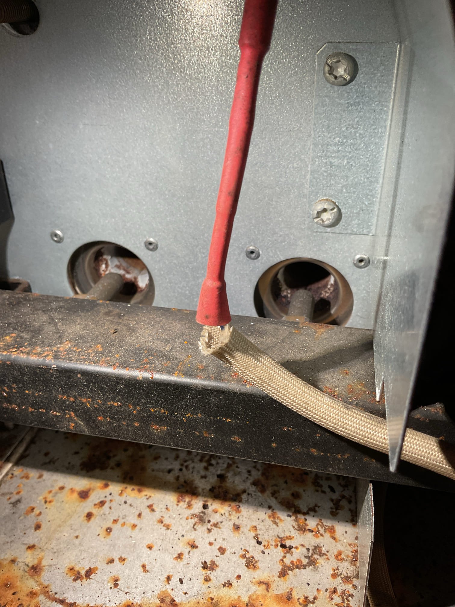 Arrived on site to perform an annual tune up on propane boiler. After our initial inspection we provided an estimate to do the work. It was accepted.

We started by turning gas and power supply off to the unit to inspect the burners. The pilot tube brass nut was rounded out and we were not able to remove it without risking breaking it. Due to this, we could not fully remove the pilot assembly to remove the burner tubes. We cleaned the burners as best as we could reach. Igniter was also worn. We inspected the heat exchanger and found that it was in really bad shape. It was covered in rust. When we checked gas pressure we found that it was set to 6.9” w.c. The unit needs 11”-14”. Adjusted it at the gas valve and when that stopped increasing the pressure we adjusted it a little more at the regulator outside. 

We then performed a combustion analysis and checked for CO leaks in the boiler room. No leaks present and analysis showed unit was firing fine. Due to the age and condition of the b