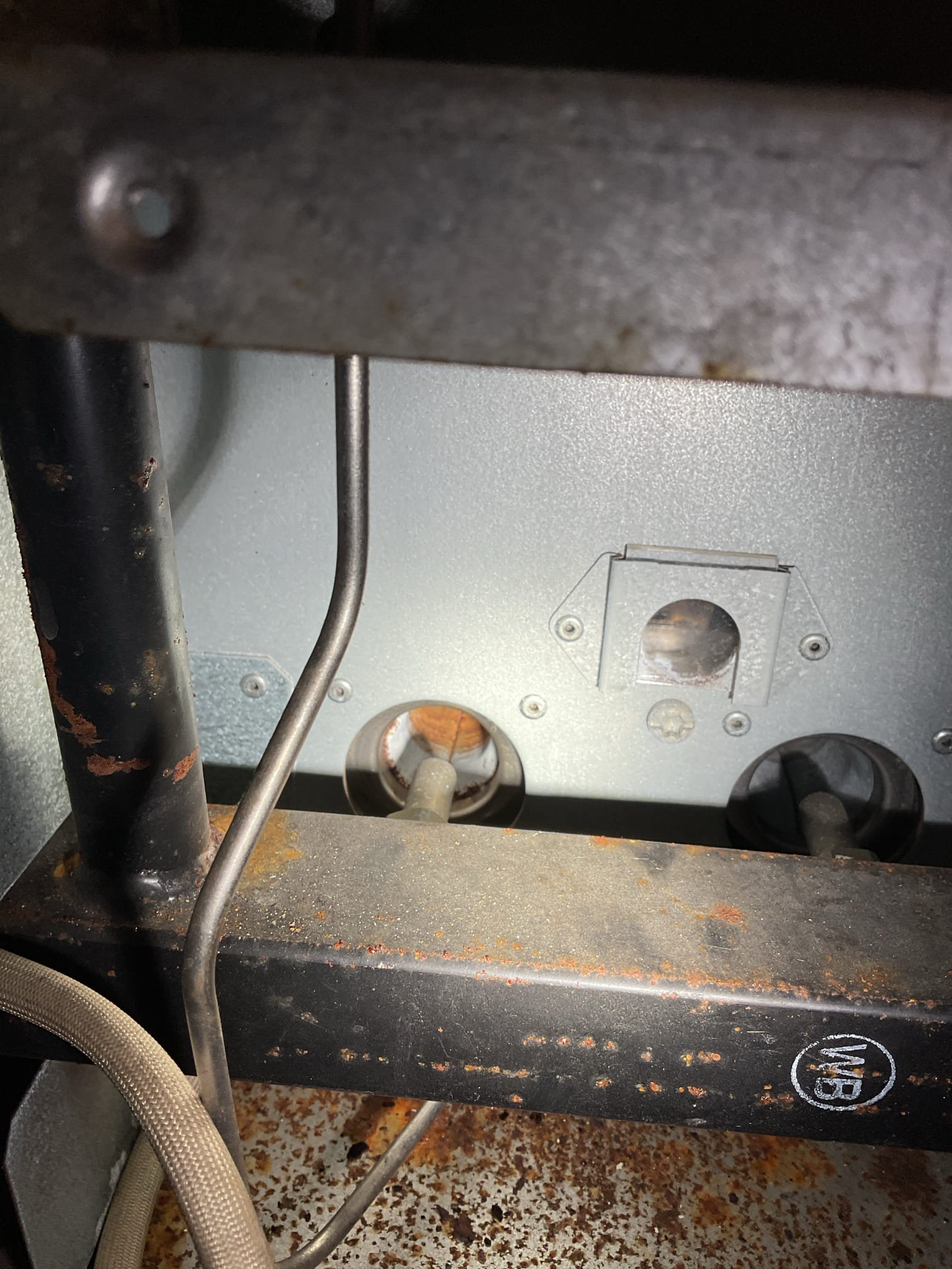 Arrived on site to perform an annual tune up on propane boiler. After our initial inspection we provided an estimate to do the work. It was accepted.

We started by turning gas and power supply off to the unit to inspect the burners. The pilot tube brass nut was rounded out and we were not able to remove it without risking breaking it. Due to this, we could not fully remove the pilot assembly to remove the burner tubes. We cleaned the burners as best as we could reach. Igniter was also worn. We inspected the heat exchanger and found that it was in really bad shape. It was covered in rust. When we checked gas pressure we found that it was set to 6.9” w.c. The unit needs 11”-14”. Adjusted it at the gas valve and when that stopped increasing the pressure we adjusted it a little more at the regulator outside. 

We then performed a combustion analysis and checked for CO leaks in the boiler room. No leaks present and analysis showed unit was firing fine. Due to the age and condition of the b