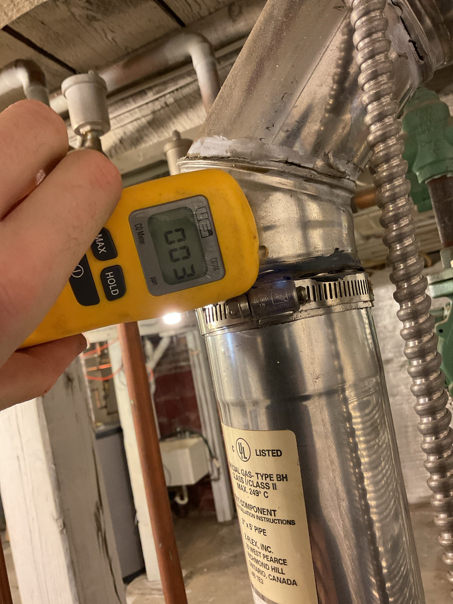 Arrived on site to perform an annual tune up on propane boiler. After our initial inspection, we provided an estimate to do the tune up as nothing obvious was found to be wrong. It was accepted.

We started by turning gas and power off to the unit to pull and clean the burners. Brushed them with a wire brush to get any rust buildup off. Inspected igniter. Was in good shape. We then put burners back and tested gas pressure. It was right at 10” w.c. Which is right where the boiler wants to be. We then performed a combustion analysis and checked for CO leaks on the venting. Combustion analysis was fine. O2 and CO2 were at fairly similar levels. We did find that the venting had some spots where the piping had cracked a little. We applied high temp silicone to all the joints on the venting to seal them up. CO leak is no longer present. System is operating properly at this time.

Due to the age and condition of the heat exchanger, we recommend starting to think about replacing it in the near