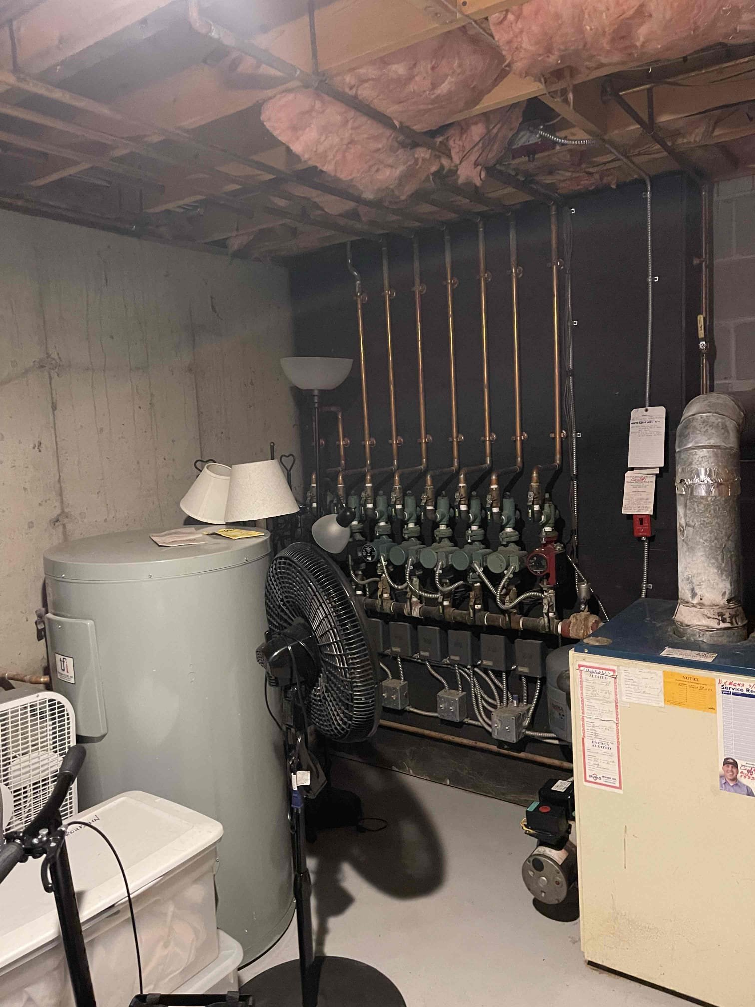 We identified an active leak at the washing machine’s laundry valves and hoses. To resolve the issue, we shut off and drained the home’s water system, removed the existing valves and hoses, discovered and replaced a corroded threaded extension, cleaned and lubricated the valve adapters, installed a new laundry valve, and restored water while purging air from the system. Before installing the new hoses, we cleaned the sediment-clogged washer screens, then tested the appliance through a short cycle to confirm proper operation and verify that no leaks remained. During our initial inspection at the main shutoff, we also evaluated the home’s pressure tank, discussed its condition with the homeowner, and provided replacement estimates for future planning.