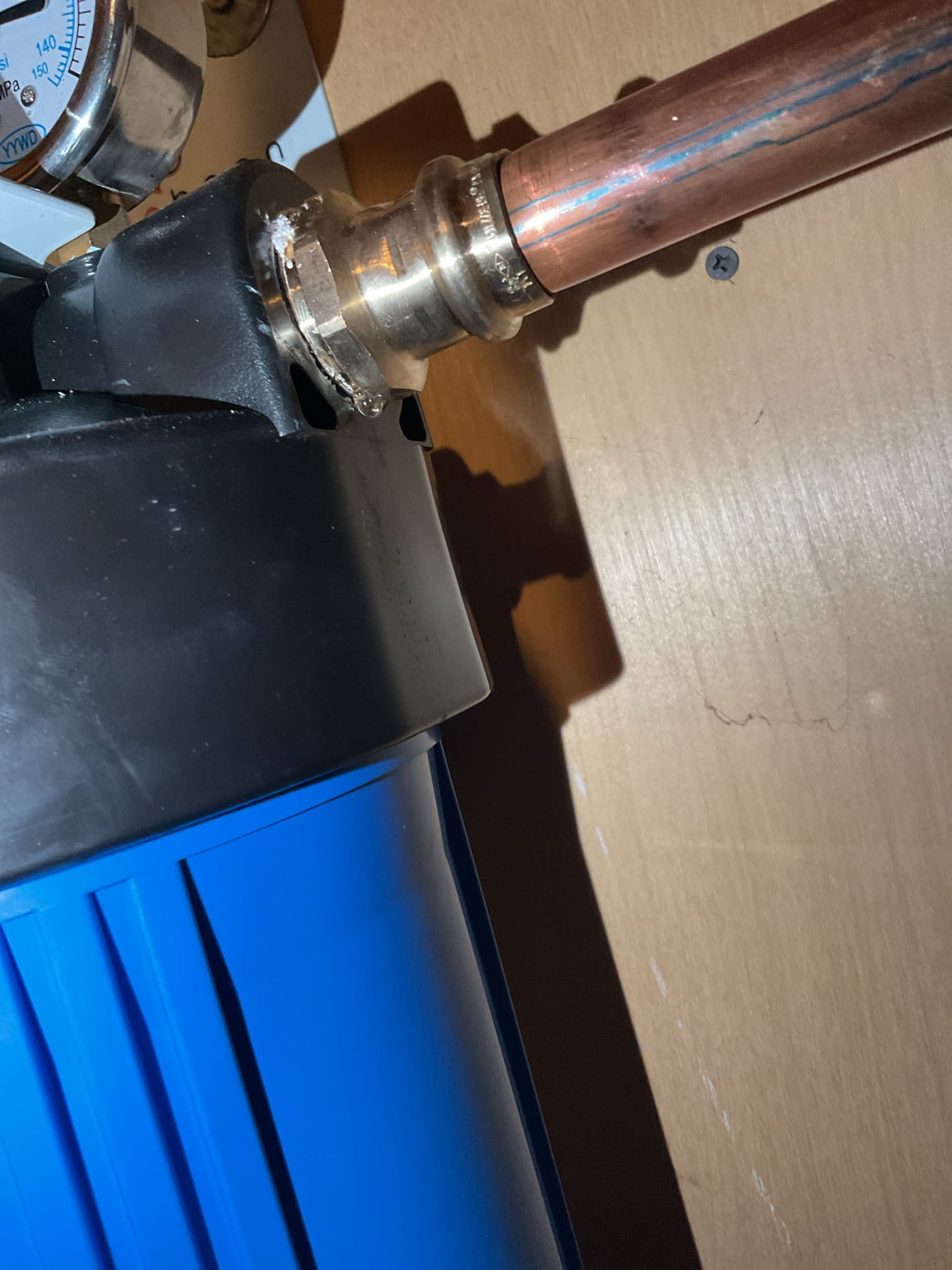 For this call, the homeowner reported inadequate hot water from a recently installed water heater. Upon arrival, I confirmed that the water heater was functioning correctly; however, the mixing valve was set improperly at 3.5 instead of the recommended 4.5, resulting in lower-than-desired water temperatures. I reviewed the mixing valve adjustment process with the homeowner for future fine-tuning of temperature preferences.

The homeowner also noted a very slow leak at the male adapter connected to the filter housing. I shut off the water, relieved system pressure, and cut the pipe between the male adapter and the 90° fitting. I tightened the male adapter approximately one full rotation and installed a metal slip coupling to reconnect the piping. The system was restored, tested, and confirmed to be leak-free and operating properly at this time.