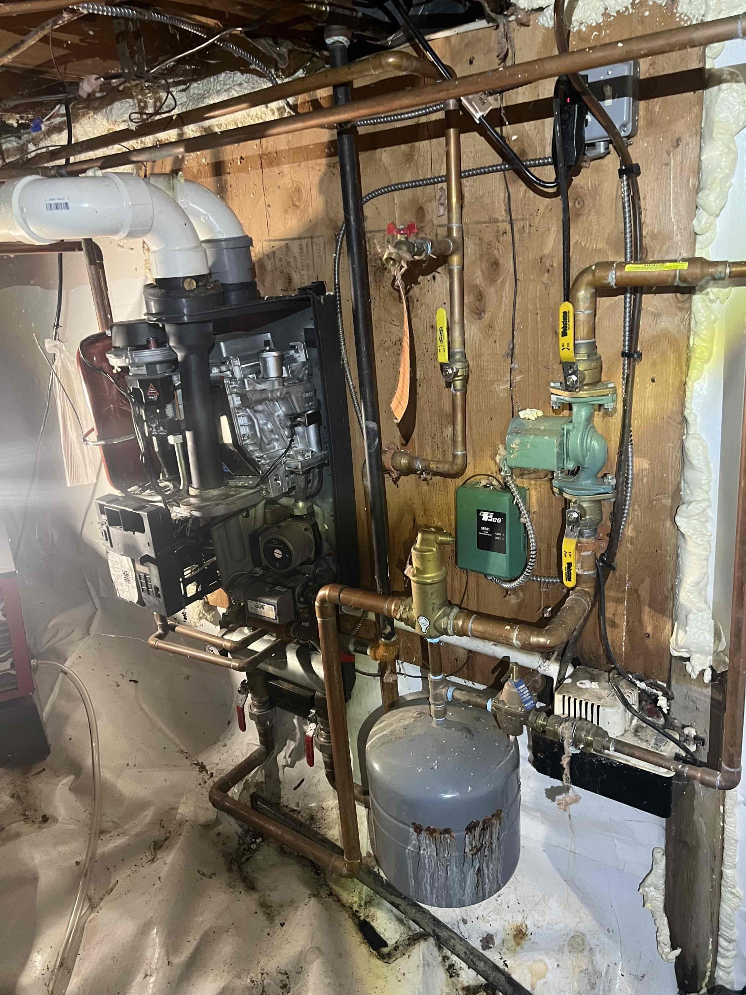 Arrived on site to investigate a propane boiler with intermittent heat. The homeowners previously had another company look at the issue, and they were told the boiler needed to be replaced. The boiler is a 12-year-old Rinnai wall-hung high-efficiency unit. I explained that this model does not have a strong reputation for longevity compared to other wall-hung high-efficiency boilers.

The boiler had an E 02 error code ( no flame forming ). I reset the boiler and it fired and ran while I was there. They said that it keeps going out on an error code. I presented options to diagnose the issue and to replace the leaking and corroded expansion tank. The homeowners decided they would prefer to winterize the house for now and plan to replace the boiler next year.