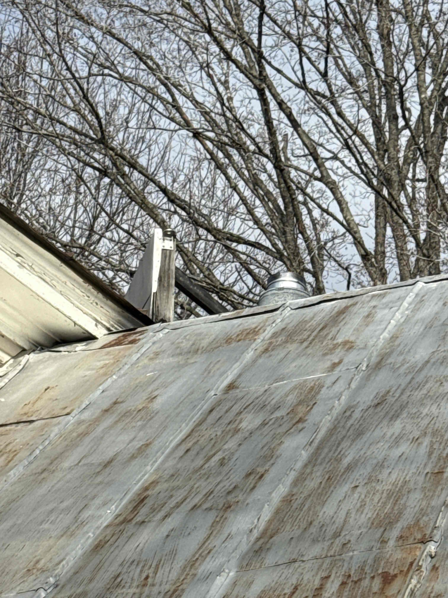 The customer reported that they were not getting heat to the second floor and believed the expansion tank might need replacement. Upon inspection, I found that the system has one circulator, which was loud and making noise. I also discovered that the boiler had no water pressure.

After starting the boiler, I observed that the bottom of the chimney was rotted out and the boiler was not drafting properly. I immediately shut the boiler down. The customer mentioned that they had been noticing odors in the mudroom at times. Underneath the boiler, there were signs of combustion byproducts, giving the appearance that the boiler sections may be separating. The boiler is heavily sooted due to the lack of proper draft.

Additionally, the connections on both the indirect water heater and the hot water coil are severely corroded. Given the condition and age of the system, we recommend full boiler replacement. The customer will also need to have a qualified professional inspect the chimney.

The b