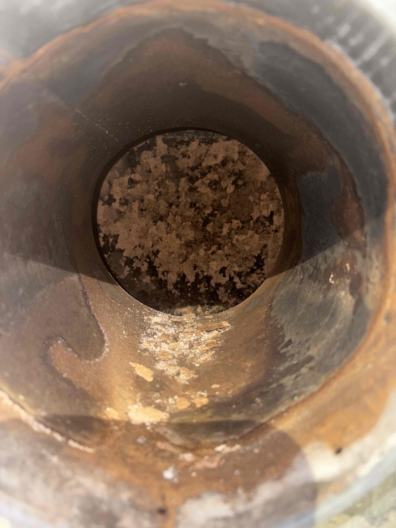 Thermo Pride Oil Furnace – Annual Maintenance
Performed annual maintenance on the Thermo Pride oil furnace. Replaced the nozzle, oil filter, and strainer. Noted significant oil sludge present in the strainer; confirmed proper oil pump pressure. Brushed and vacuumed the heat exchanger and flue pipe. Tested and verified the operation of all system safeties and burner components. Inspected and cleaned the fan motor and confirmed proper operation. Completed combustion, smoke, and draft tests.
System is operating properly at this time.

Oil-Fired Water Heater – Annual Maintenance
Performed annual maintenance on the oil-fired water heater. Replaced the nozzle and strainer. Brushed and vacuumed the heat exchanger and flue pipe. Tested and confirmed the operation of all system safeties. Completed combustion, smoke, and draft tests.
System is operating properly at this time.

Low Water Pressure Concern
Mary reported low water pressure at all fixtures throughout the home. Upon evaluation, the we