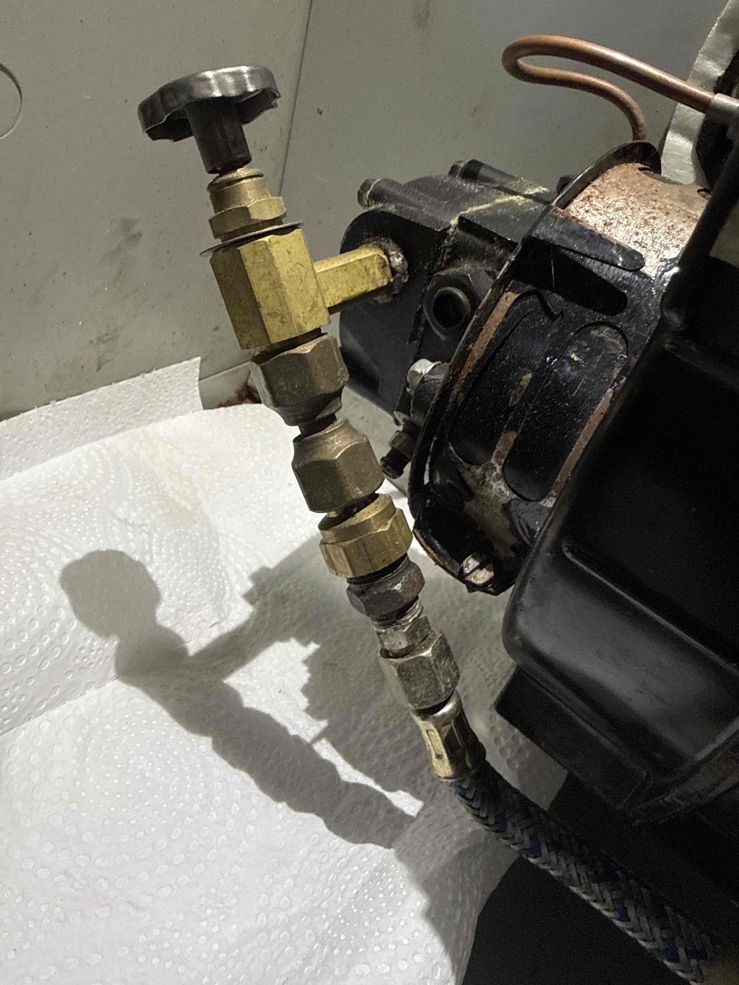 Performed annual maintenance on the customer’s oil-fired furnace. Replaced the nozzle, filter, and strainer. The furnace and heat exchanger were found to be clean and did not require vacuuming. During inspection, the burner electrodes were found to be worn and in need of replacement; this was completed with the customer’s approval.

Resealed/recemented the smoke pipe connection to the chimney. Verified all system safeties and performed both combustion and draft tests. The furnace is operating within proper specifications.

Installed a bracket in the return area to support the air filter and prevent it from resting on the blower motor, which had been causing heat damage to the filter.

At this time, the system is running properly.