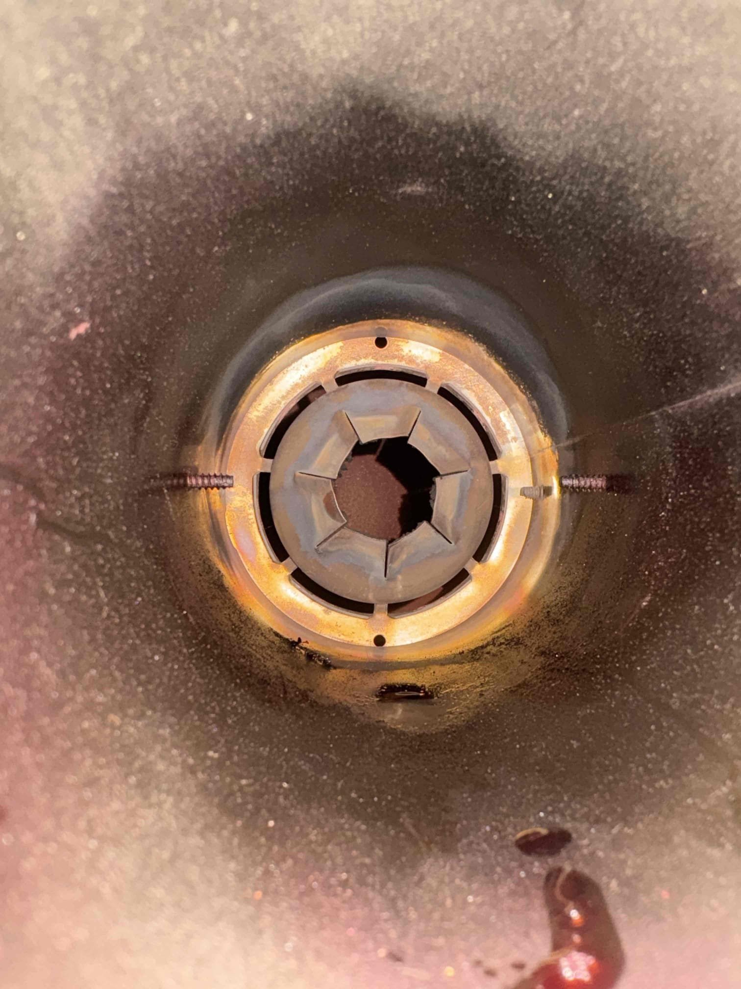 I am a highly skilled home service professional, and I recently completed a job on a Thermo Pride oil furnace. The furnace was in need of annual maintenance, including replacement of the nozzle, oil filter, and pump strainer. The heat exchanger and flue pipe were thoroughly brushed and vacuumed, and furnace cement was applied around the chimney connection to ensure a tight seal. Additional screws were installed in the flue piping to improve stability and safety. All burner components and system safeties were tested and confirmed to be operating properly.
During the inspection, we found the combustion chamber to be deteriorated and in poor condition. Replacement of the chamber is strongly recommended as soon as possible to maintain safe and efficient operation; an estimate for this work will be provided. A combustion test, smoke test, and draft test were completed to verify performance.

We also recommend installing proper air filters on the unit, as the fan motor showed excessive debri