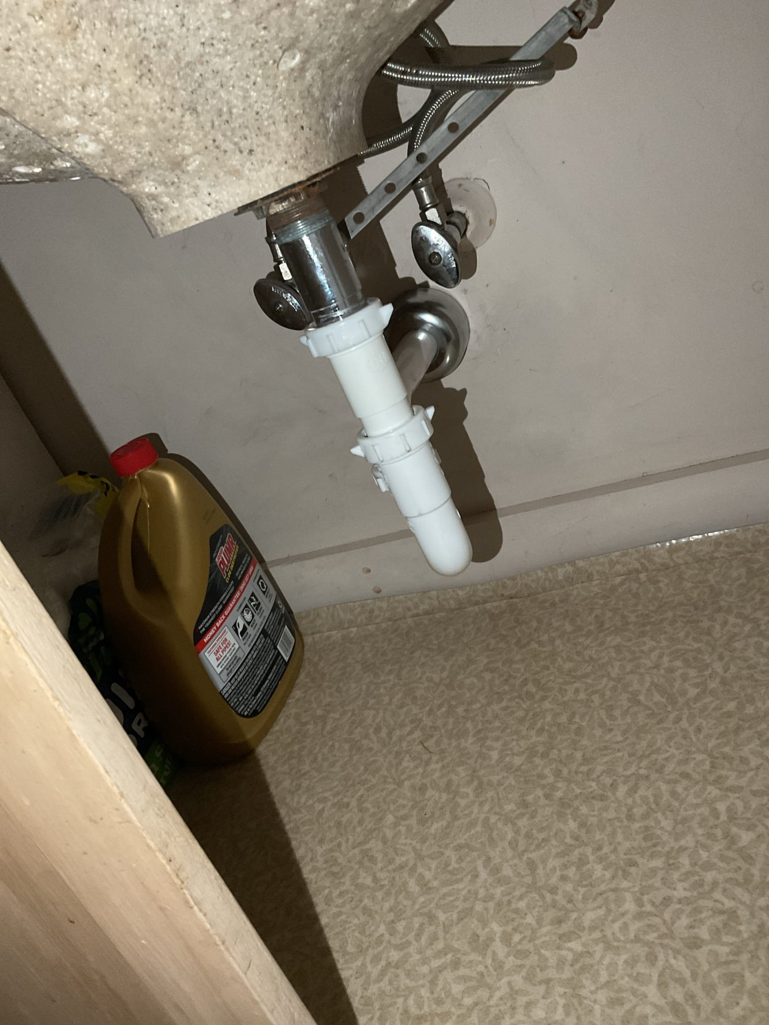 I am a home service technician, and I recently completed a plumbing job at a residence. The bathtub and lavatory drains were found to be slow due to buildup restricting flow. We attempted to clear the lines using Thrift drain cleaner, but when no improvement was observed, we removed the lavatory trap and used an electric snake to clear a large hair blockage. The trap was reinstalled and the drain was tested, confirming proper flow with no restrictions.
For the bathtub, Thrift treatment also produced no improvement, so we removed the trip lever assembly and snaked the overflow line, removing a significant hair blockage. After reinstalling the overflow, the tub was tested and drainage was fully restored.

We also found the lavatory’s chrome P-trap leaking due to prior attempts by homeowner to clear the blockage. We recommended replacing it with a new plastic tubular P-trap to provide a reliable, properly sealed connection. The new trap, tailpiece, and chrome bell cover were installed and