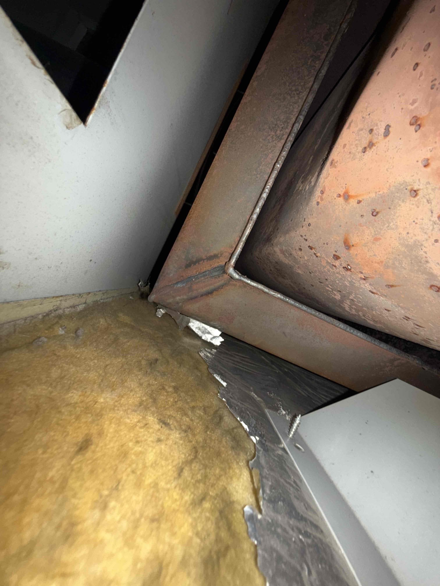 The customer reported that their furnace was producing a loud noise during operation, which would stop once the blower activated. I began by replacing the nozzle and verifying the electrode settings, which were correct. After re-firing the furnace, the noise persisted. I then removed the blower assembly and drilled two inspection holes in the supply plenum to perform a camera inspection. The heat exchanger was found to be heavily rusted; however, no visible cracks or holes were detected. I pulled the blower out of the back of the furnace and looked at the heat changer as much as I could visibly see and did not see any holes or cracks.
I tested multiple nozzle sizes and adjusted the pump pressure, but the noise did not improve. I ultimately returned to the original 0.75 x 80A nozzle and completed a full combustion analysis. I also performed multiple heat-exchanger tests, monitoring combustion values with and without the blower running. Combustion readings remained stable and did not shi