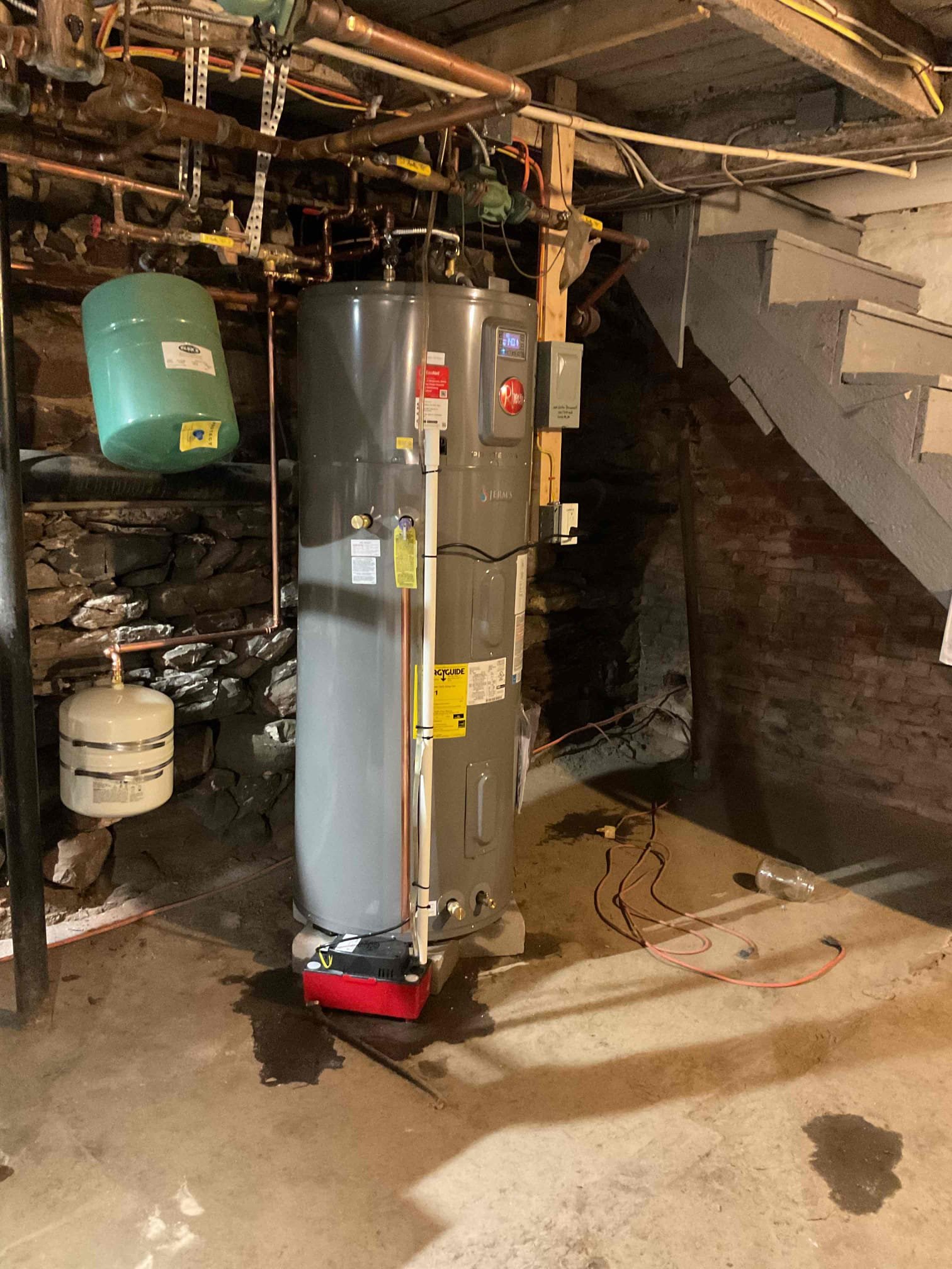 I am a highly skilled home service professional who recently completed a job replacing an existing hybrid water heater with a new Rheem hybrid unit. The replacement process involved removing the old unit, connecting the new unit to the existing domestic water piping, condensate line, and electrical supply, and installing a new mixing valve. The water heater temperature was set to 140°F, and the mixing valve was adjusted to 4.5 to ensure a consistent 120°F supply to household fixtures. After the installation, I provided the customer with a thorough walkthrough of daily operation procedures and recommended long-term and short-term maintenance practices.