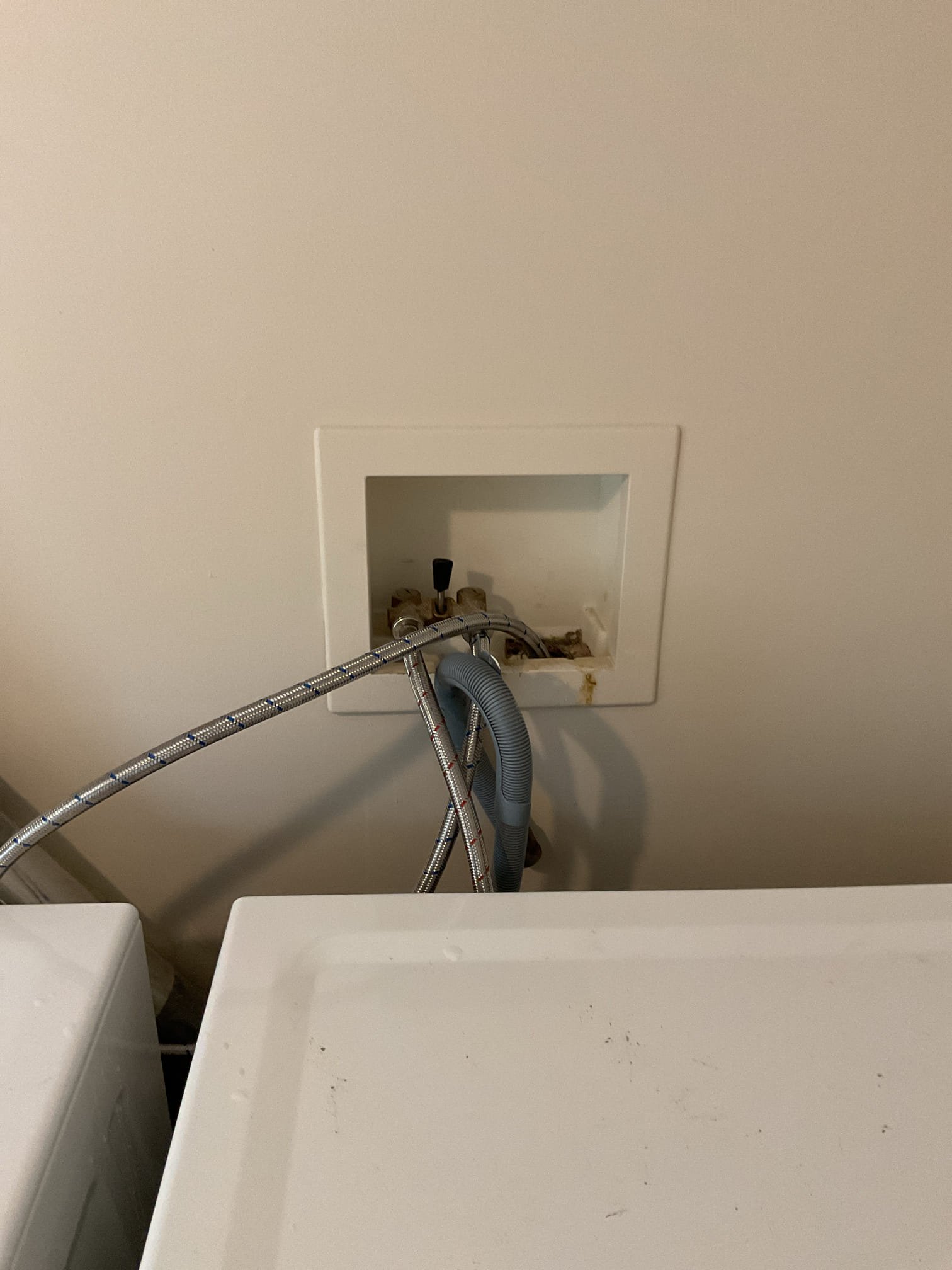 The customer had signs of water damage in the dining room below the laundry room, a toilet that was flushing poorly, and a kitchen faucet that was dripping by. The customer stated the laundry supply lines had been leaking and that he had replaced them. The water damage had since dried up indicating that the supply line was the cause. The toilet had a drain snake in it from when the customer tried to snake it. The tech removed the drain snake and upon doing that pulled out some debris. After that, the toilet drained fine. The tech also ran water into the washer drain to test for leaking in the drain and for blockages in the drain. Water ran by fine with no signs of water damage. The tech also looked into replacing the hot side cartridge in the kitchen sink. The tech sent the estimate for this replacement.