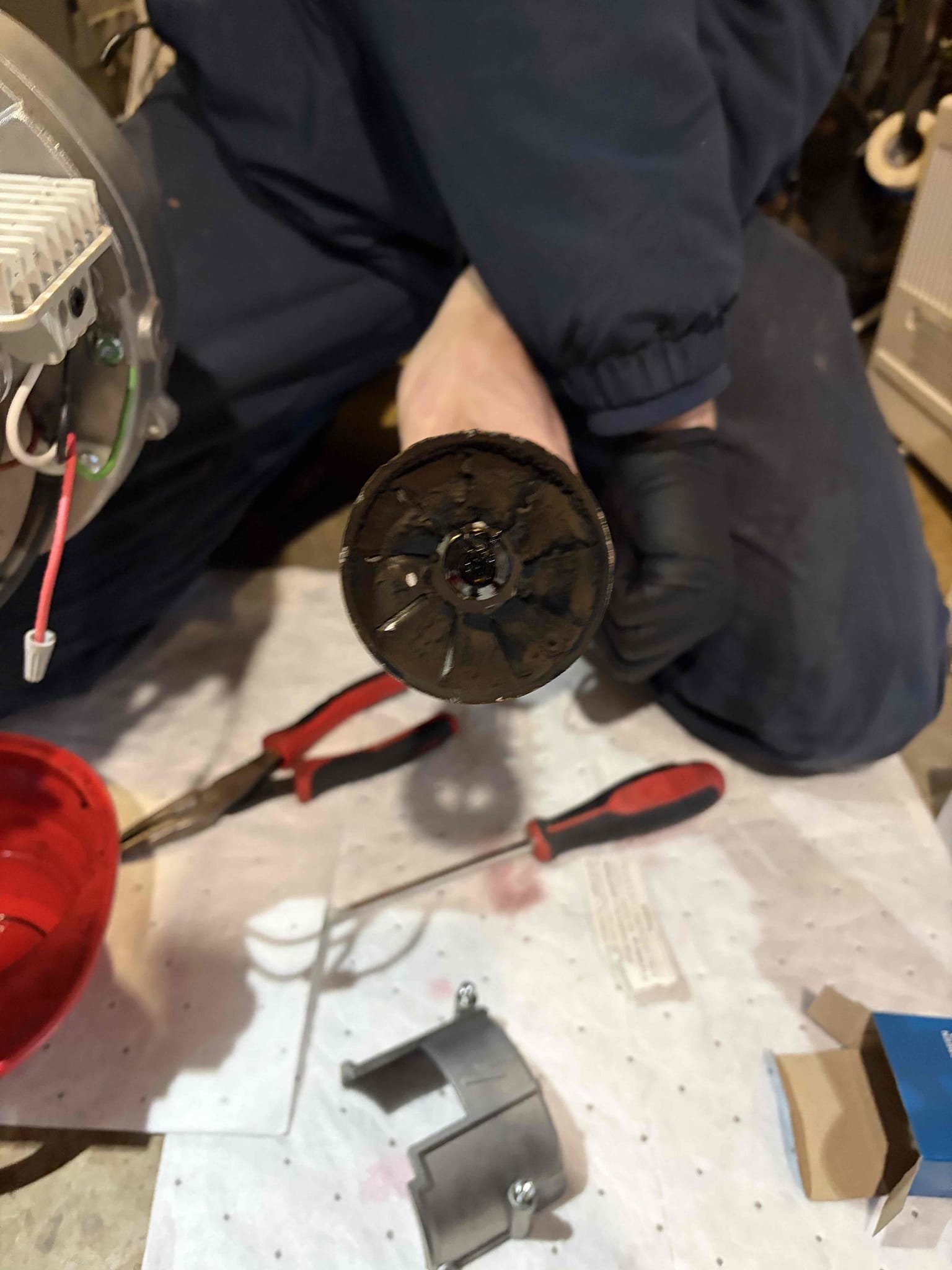 I performed annual maintenance on a Buderus oil boiler, including replacing the nozzle, oil filter, and pump strainer. I also conducted a combustion and draft analysis, tested all system safety controls, and replaced the expansion tank and relief valve. I checked the system for leaks and verified that all heating zones were circulating and operating correctly. The boiler is now functioning as expected.