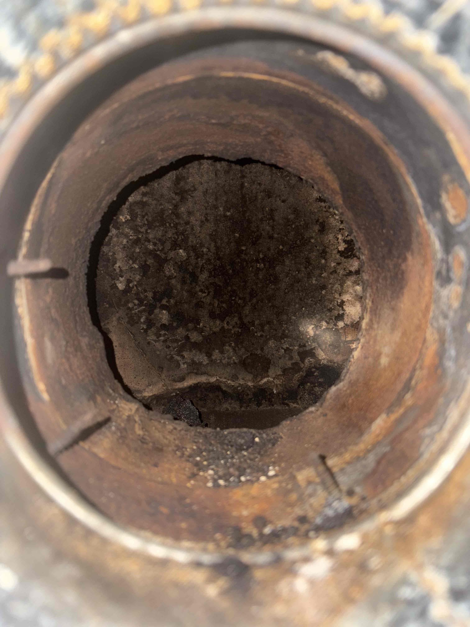 I am a highly skilled home service professional. I recently completed an annual maintenance service on a Spirit oil furnace. During the inspection, I found multiple cracks in the combustion head and ceramic heat shield. I replaced the damaged F3 combustion end cone and ceramic heat shield with new parts. I also performed a combustion analysis, smoke test, and draft test to ensure the system was operating properly. I am pleased to report that the system is now operating properly.