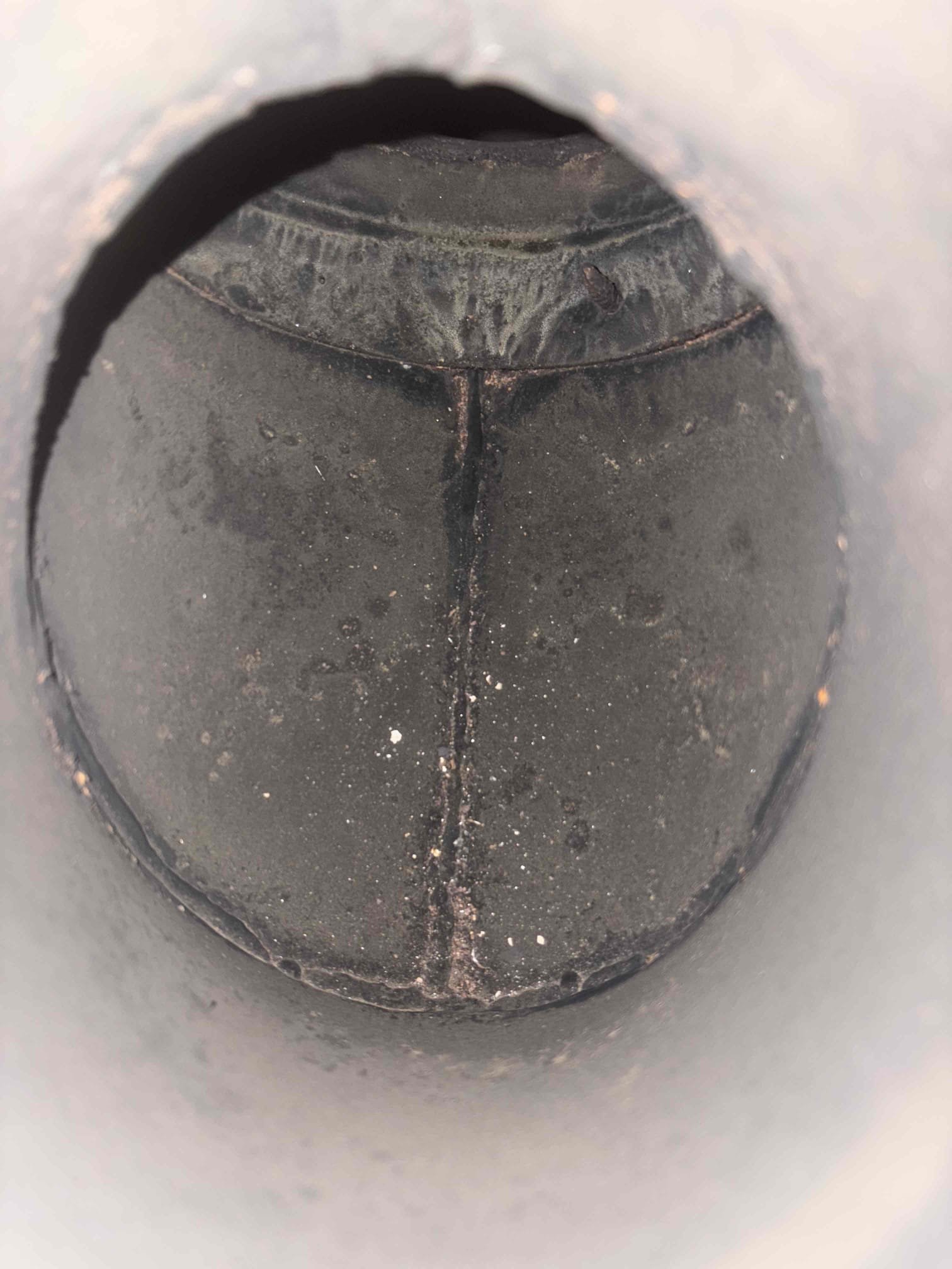 I am a highly skilled home service professional. I recently completed an annual maintenance service on a Spirit oil furnace. During the inspection, I found multiple cracks in the combustion head and ceramic heat shield. I replaced the damaged F3 combustion end cone and ceramic heat shield with new parts. I also performed a combustion analysis, smoke test, and draft test to ensure the system was operating properly. I am pleased to report that the system is now operating properly.