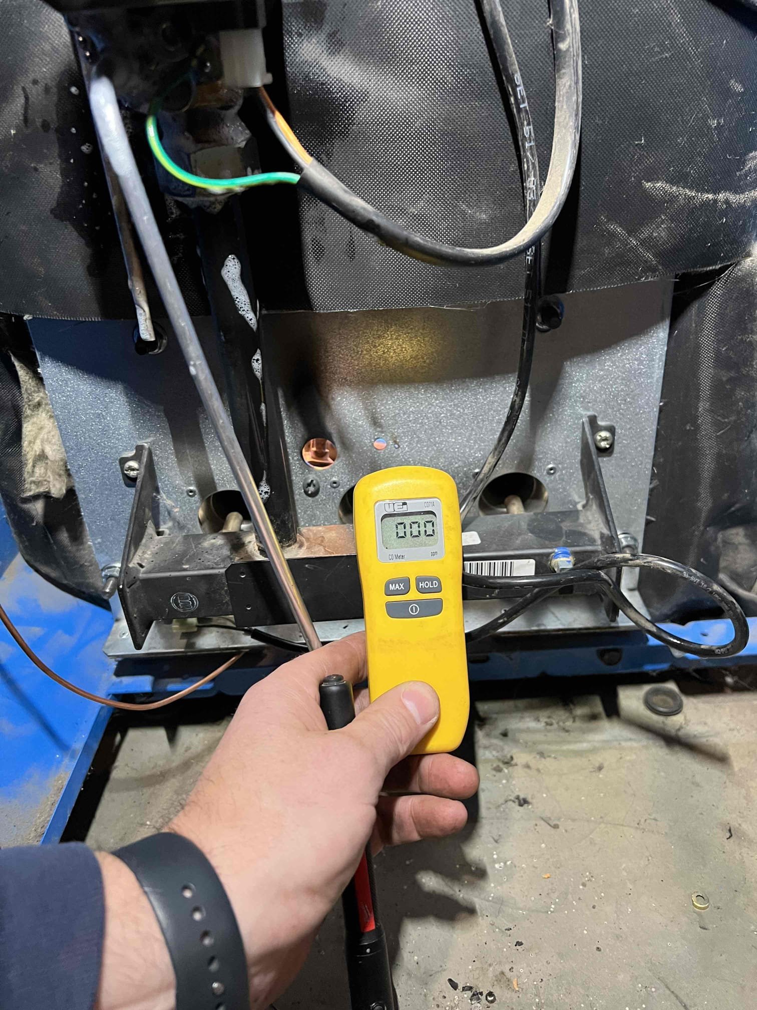 I arrived at the customer's home to diagnose a no-heat issue on a Buderus propane boiler. Upon inspection, I found black soot around the pilot assembly and discovered that the pilot line had broken off at the nut. I replaced both the pilot line and the thermocouple and bubble-tested the pilot and gas line, which resulted in no leaks. I also checked CO levels, which were normal. I verified that the system was operating properly. I emailed estimates to perform an annual tune-up, replace the relief valve, and enroll the customer in Jerm's home care club.