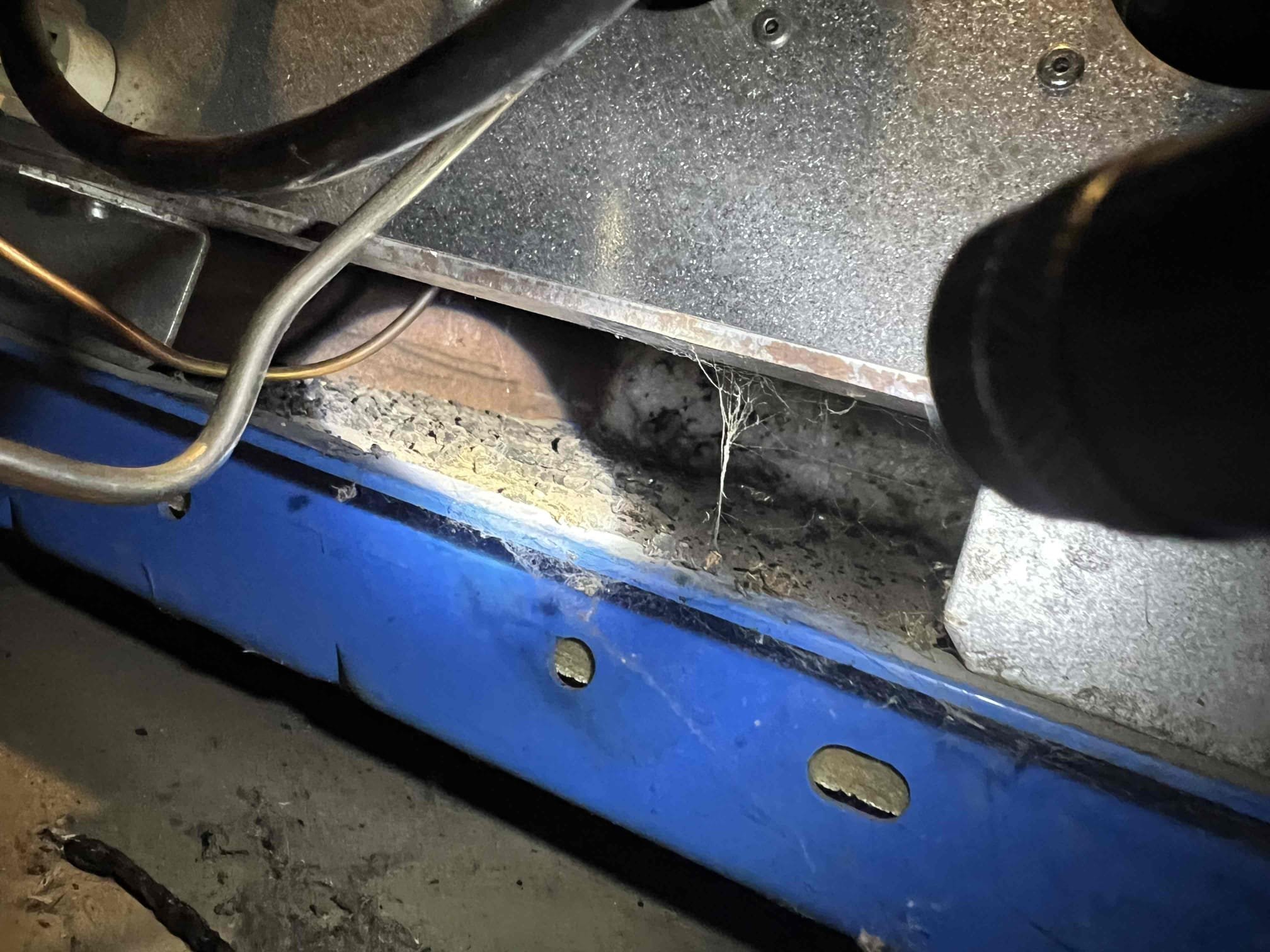 I arrived at the customer's home to diagnose a no-heat issue on a Buderus propane boiler. Upon inspection, I found black soot around the pilot assembly and discovered that the pilot line had broken off at the nut. I replaced both the pilot line and the thermocouple and bubble-tested the pilot and gas line, which resulted in no leaks. I also checked CO levels, which were normal. I verified that the system was operating properly. I emailed estimates to perform an annual tune-up, replace the relief valve, and enroll the customer in Jerm's home care club.