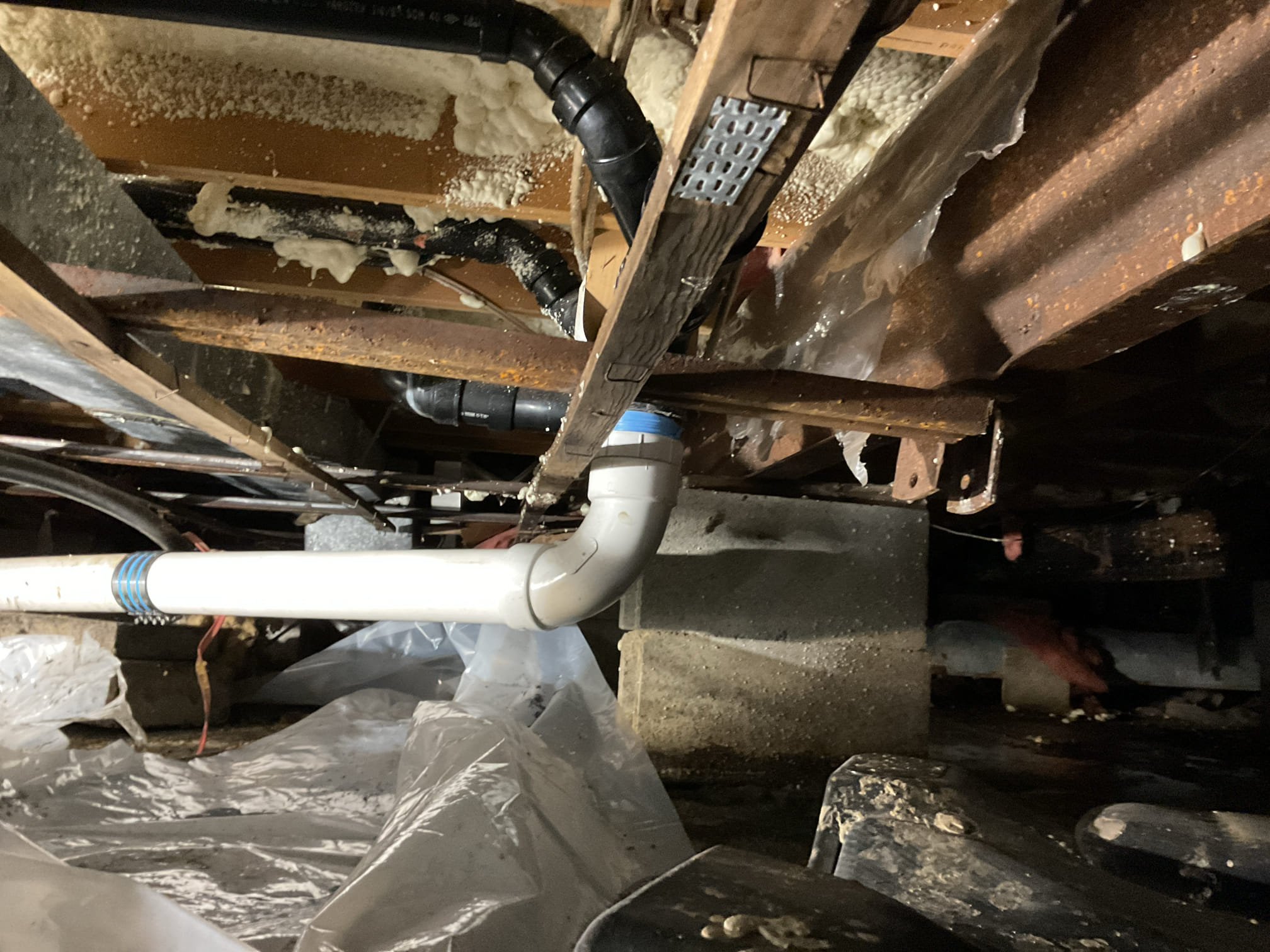 The client called to report a leaking drain pipe. I arrived at the location and found that the section of drain pipe was leaking upon arrival. I removed the banded coupling and unthreaded the drain pipe at the 3” ABS threaded adapter. I then installed a threaded coupling into a long sweep 90. I ran a new section of drain pipe and adapted to the existing drain with a code compliant banded coupling. I then ran the drain to test for a leak. The drain is working well with no leaks present at the time of service.