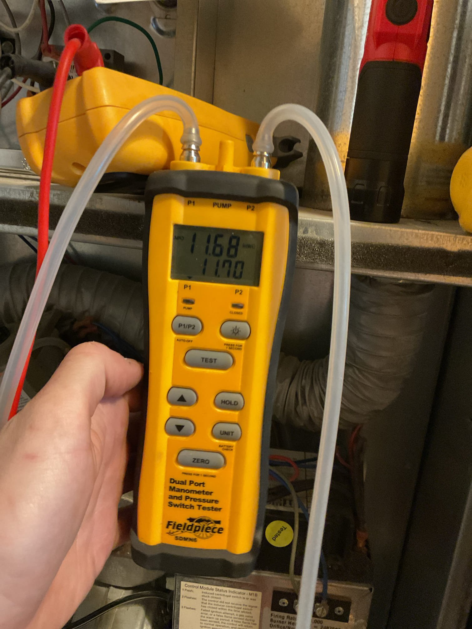 Arrived on site to perform an annual tune up on a propane Miller furnace. After our initial inspection, we provided an estimate to do the tune up. It was accepted. 

We started by inspecting the igniter. Looked good. While we had the igniter pulled out we inspected the combustion chamber. We found that the refractory had at least two cracks. It will eventually collapse and fall into the heat exchanger. Matt mentioned he wanted to replace the furnace next year but we will be sending an estimate for the refractory just so they are aware of the price if they choose to not replace furnace. We also checked gas pressure, amperage of the inducer and blower motors, and the capacitance of blower capacitor. We found that the blower motor was pulling more amps than it was rated for. We believe it could be due to the fact that the capacitor was out of specification. We tested that capacitor at 9uf and it’s rated for 10uf +-5%. We also checked for CO leaks. None present, system is operating safely 