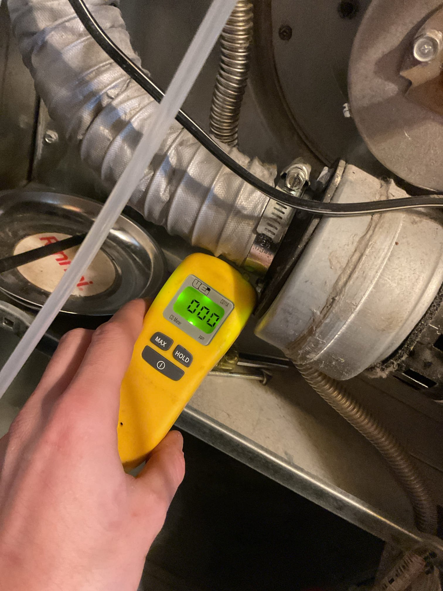 Arrived on site to perform an annual tune up on a propane Miller furnace. After our initial inspection, we provided an estimate to do the tune up. It was accepted. 

We started by inspecting the igniter. Looked good. While we had the igniter pulled out we inspected the combustion chamber. We found that the refractory had at least two cracks. It will eventually collapse and fall into the heat exchanger. Matt mentioned he wanted to replace the furnace next year but we will be sending an estimate for the refractory just so they are aware of the price if they choose to not replace furnace. We also checked gas pressure, amperage of the inducer and blower motors, and the capacitance of blower capacitor. We found that the blower motor was pulling more amps than it was rated for. We believe it could be due to the fact that the capacitor was out of specification. We tested that capacitor at 9uf and it’s rated for 10uf +-5%. We also checked for CO leaks. None present, system is operating safely 