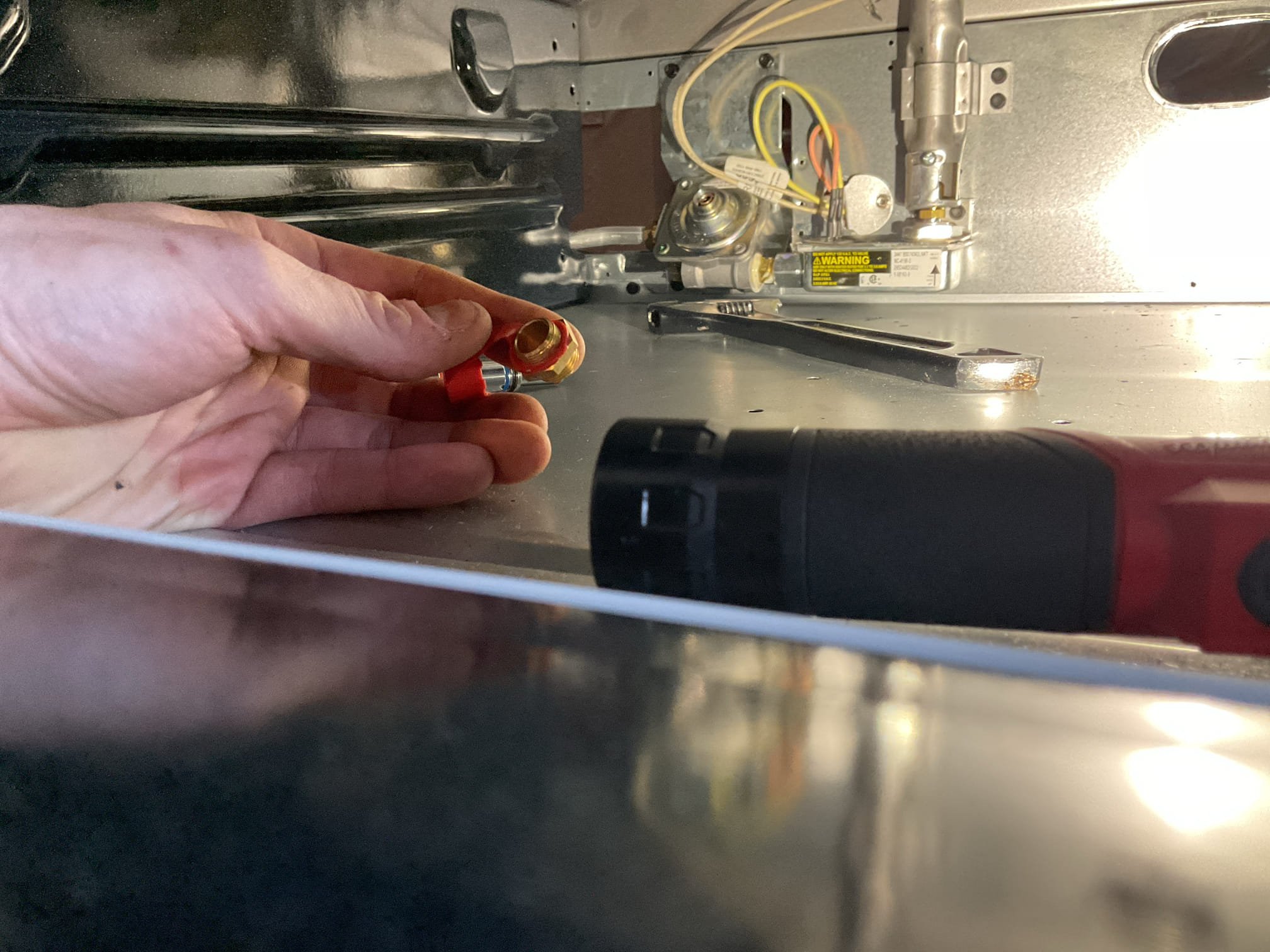 Arrived on site to convert and connect new propane stove. After our initial inspection, we provided an estimate to convert the stove.

We started by turning off gas supply and disconnecting the old stove. We then converted the gas regulator at the back of the new stove along with the oven orifice and cooktop orifices. Once everything was converted we turned gas on and checked for leaks using a bubble solution. No leaks present. We then turned the cooktop burners on to adjust flames. No adjustments needed for both low and high fire. No adjustment needed on oven burner either. Oven is working properly and safely at this time.

Provided quote for JHCC. Marcia is going to talk with husband and if he agrees they want to sign up for our service partner plan. She also mentioned wanting to get her propane water heater and boiler serviced sometime in January.

Thank you for your business!