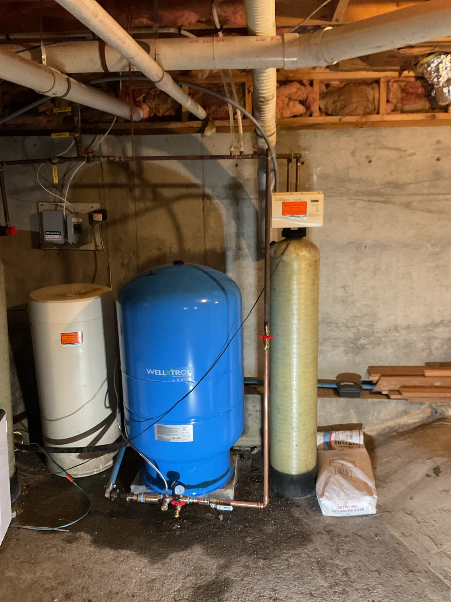 Upon arrival tech removed and disposed of old rusted pressure tank, pressure switch, and tank tee. Tech proceeded to install new 85 gallon pressure tank with a 40/60 pressure switch and tank tee. Tech charged tank to 38 psi, turned pump on, flushed out air pockets, and adjusted the switch. Pressure tank is working well with no leaks present at time of install. 

Tech then removed service port from the neutralizer unit and drained it down. Then I added 1 cube of neutralizer media. This brought the freeboard from 26” to 18”. I then proceeded to fill the tank, ran approximately 40 gallons of water through the unit, and sent it into a regen cycle to flush air out of the unit to prevent the bed from lifting and flush the finer media and prevent the media from going into homes appliances. 

I then removed and disposed of RO filters and replaced them. I then individually bled the sediment, carbon, and membrane to ensure proper function. I then drain the holding tank and charged it to 6psi fro