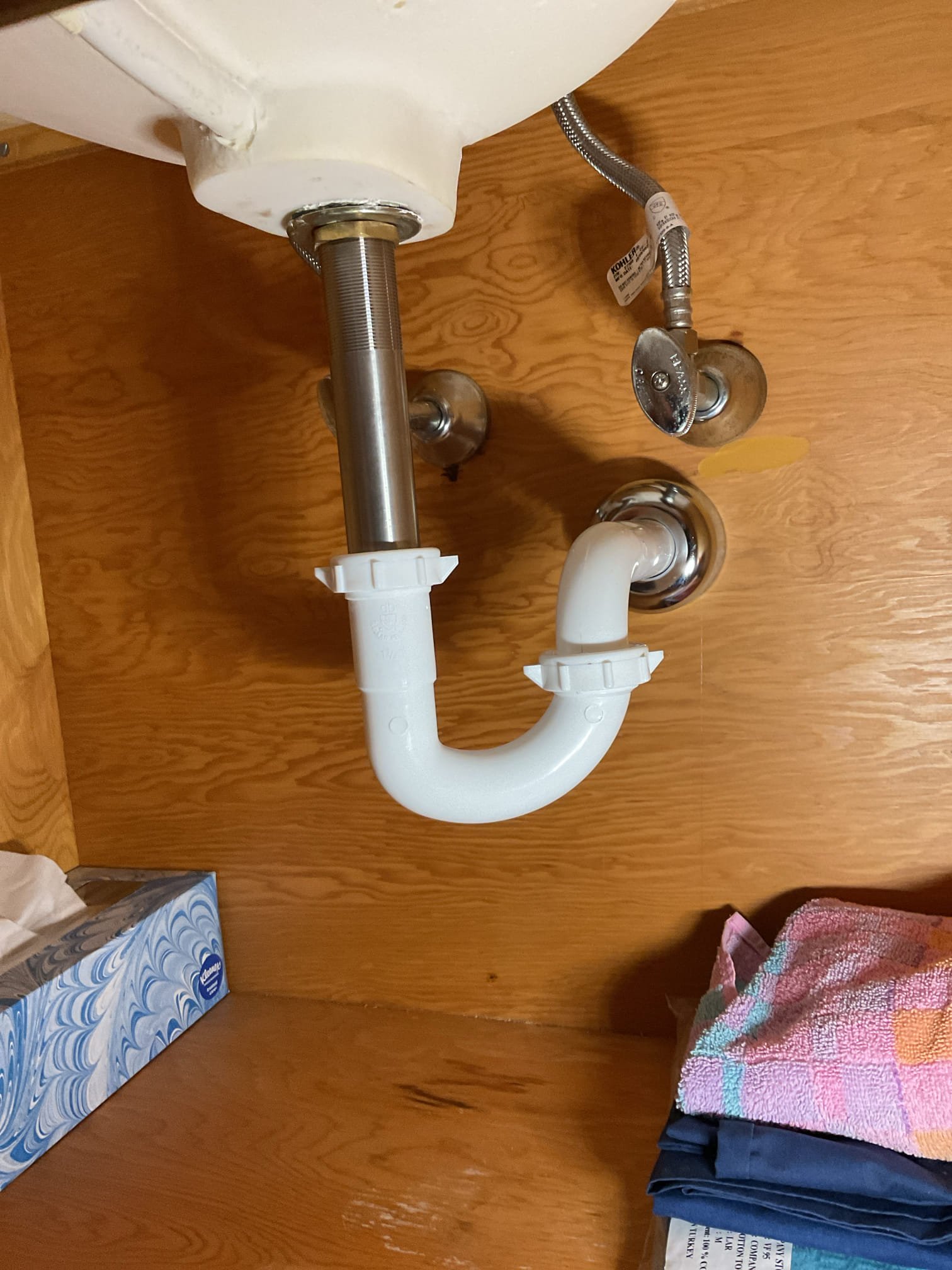 Upstairs Bathroom Toilet Repair:
The upstairs bathroom toilet tank was loose, and the flush tower was creating excessive noise. We recommended a full rebuild of the internal components to secure the tank and restore quiet, reliable operation for improved comfort and efficiency.
Water was shut off to the toilet and the tank was drained and removed. All internal components were removed and surfaces were thoroughly cleaned. A new 3” flush valve, fill valve, tank-to-bowl gaskets, flapper, and handle were installed and tightened securely. The tank was remounted to the bowl, a new braided stainless supply line was connected, and water was turned on. The fill valve was adjusted and the toilet was flushed multiple times to verify proper operation with no leaks observed at this time.

Upstairs Bathroom Lavatory Faucet Replacement:
The bathroom faucet was leaking from the cartridge, and the pop-up assembly showed corrosion. We recommended replacing the lavatory faucet to prevent future leaks and