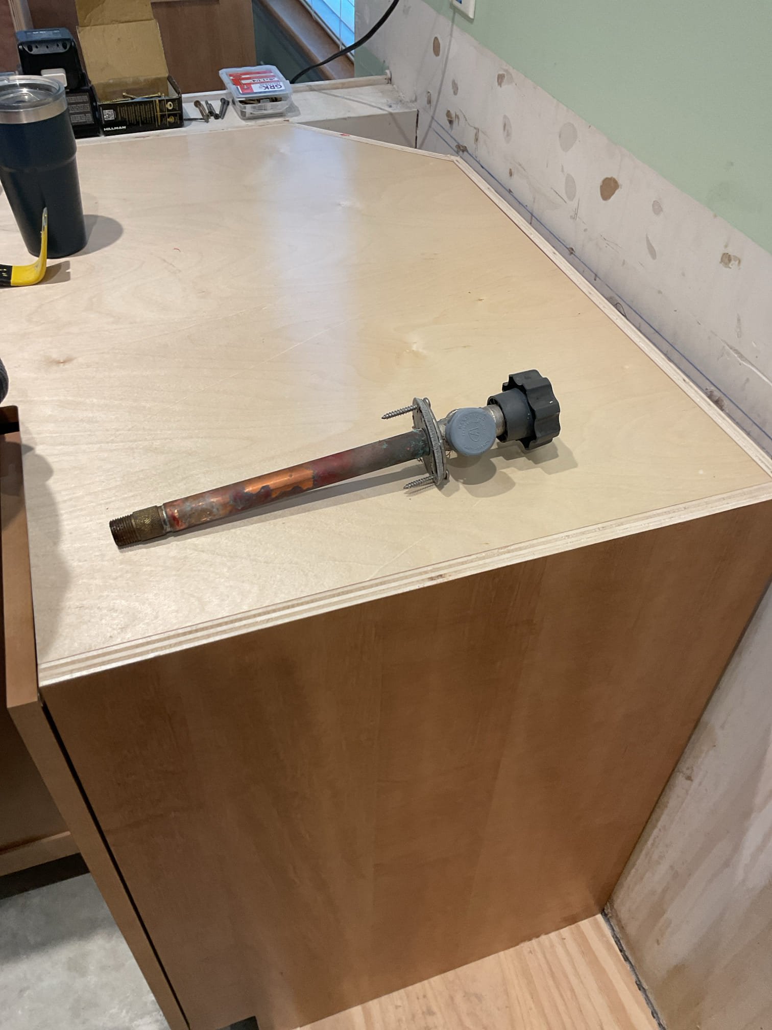 -Upon arrival customer needed plumbing in the cabinet removed and capped off for the installation of new cabinets. Tech removed the hose bib and shutoffs from the kitchen plumbing and pressed on two caps. 

Return visit to be scheduled when the cabinets are installed. 

Email invoice to collect payment