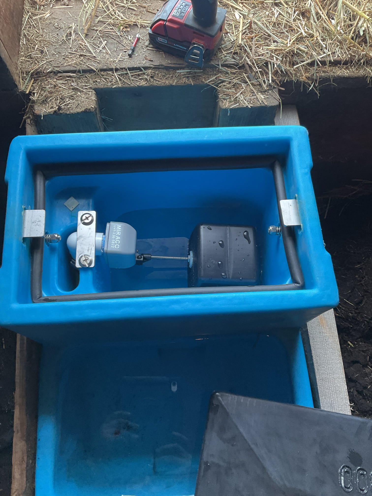 Installed customer-supplied water trough to replace the existing failed unit. Preassembled outdoor trough components including float, supply line, and shutoff valve. Removed the original trough and disconnected the electrical heating element. Set the new trough in the existing location, secured it to blocking, connected the water supply, and added additional blocking to properly level and stabilize the unit. Turned water on, adjusted fill valve for correct water level, and confirmed there were no leaks in the work performed.

Due to the unit being installed outdoors without a heating element, no warranty is offered on this installation because of potential freezing conditions.