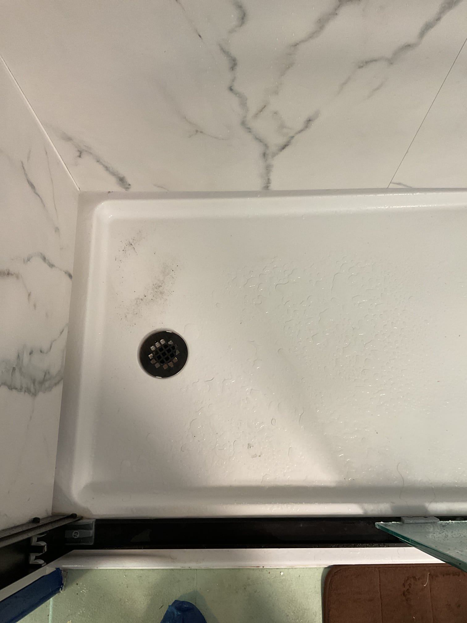 Fond water in upstairs shower that has recently been installed to not be operation properly. The contractor that installed it replaced the cartridge and it worked for 2 days before reverting back to the same issues and advised the homeowners to have the water filtration looked at. While doing our evaluation we noticed the water soft water filter had been in bypass but claimed they would hear it do its weekly back wash. So we turned the valves to their appropriate on/off positions to force water through the filter. We then went upstairs took the cartridge out of the shower valve and flushed sediment out of the valve on both the hot and cold sides of the valve clearing a substantial amount of sediment. We attempted to clean the cartridge but to no success. Homeowners are going to speak with the installer about possibly replacing the cartridge before exploring potential replacing the valve again