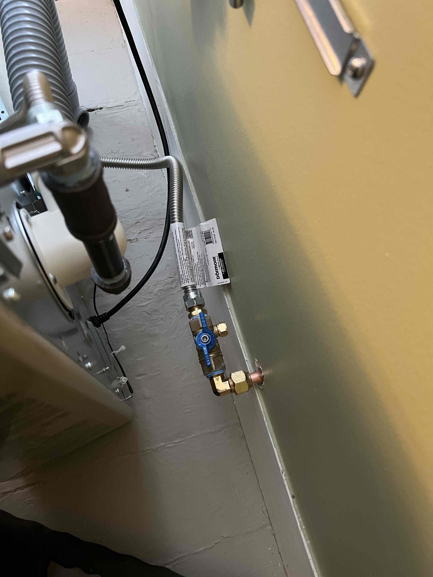 Installed a 22k BTU Rinnai direct-vent wall heater in Apartment #3 in the living room. Ran new 5/8” and 1/2” copper gas lines from the meter to the Rinnai and tied into the existing water heater gas line. During our leak check we found a gas leak, so we shut off the water heater gas line and the new piping passed the leak check. We did not have time to investigate the source of the leak. Mr. Walthour said he will contact his gas company, and will let us know if he needs our assistance.

Leak-checked the new gas line to the Rinnai at 8.5 in/wc for 3 minutes—no leaks present. Checked carbon monoxide levels—no issues found. Verified operation and the system is functioning properly at this time. Removed old gas line and old heater and sealed the wall penetrations with silicone caulking.