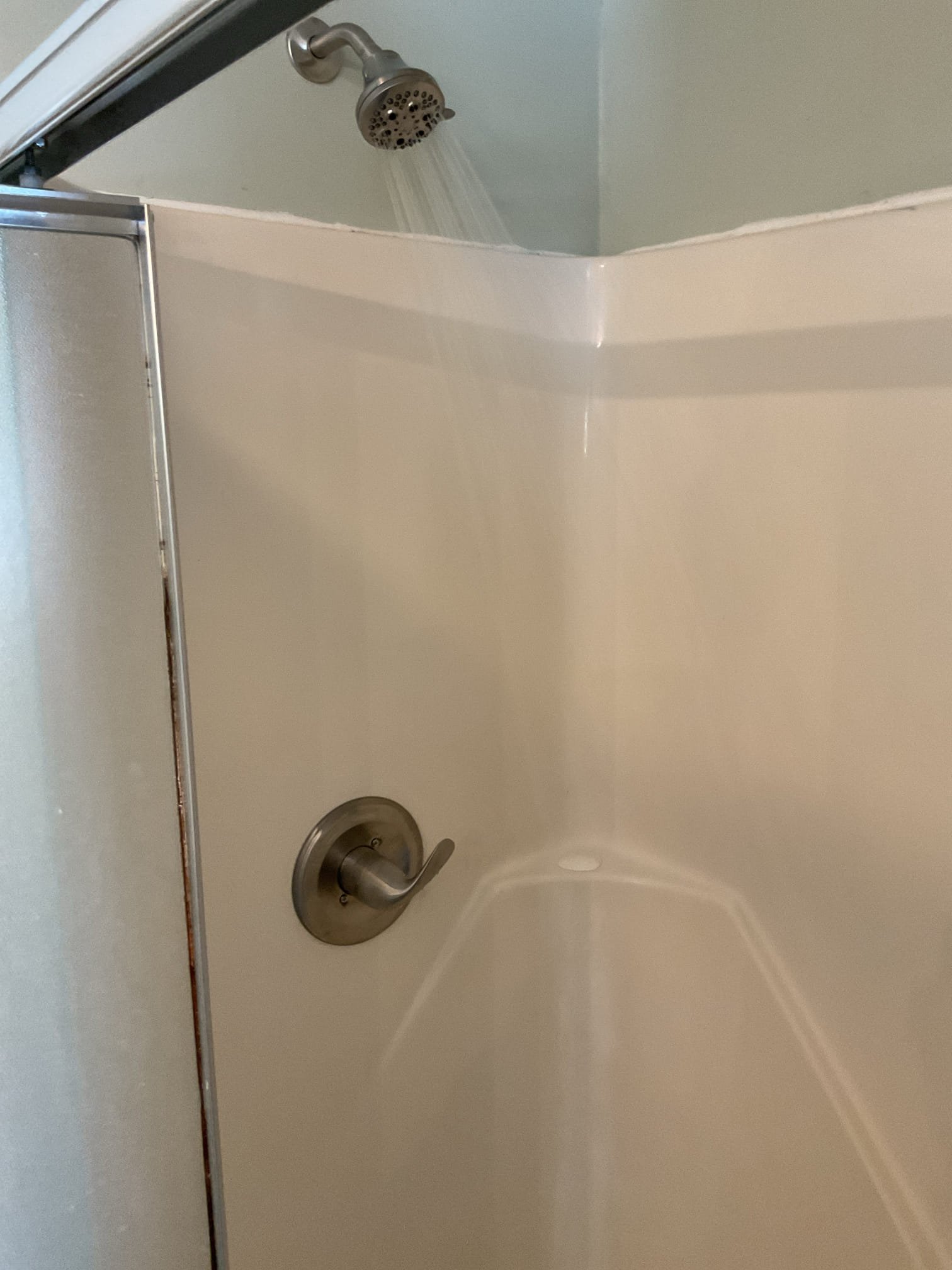 We removed the existing Symmons shower valve due to its ongoing leak and installed a new Delta shower valve to provide improved reliability and long-term performance. The wall was opened as needed to allow proper access, and the new valve was set in place with all required fittings, ensuring every connection was secured to current plumbing standards. After installation, the system was thoroughly tested to confirm proper operation and verify that the leak had been fully resolved. All work was completed in a clean, professional manner.