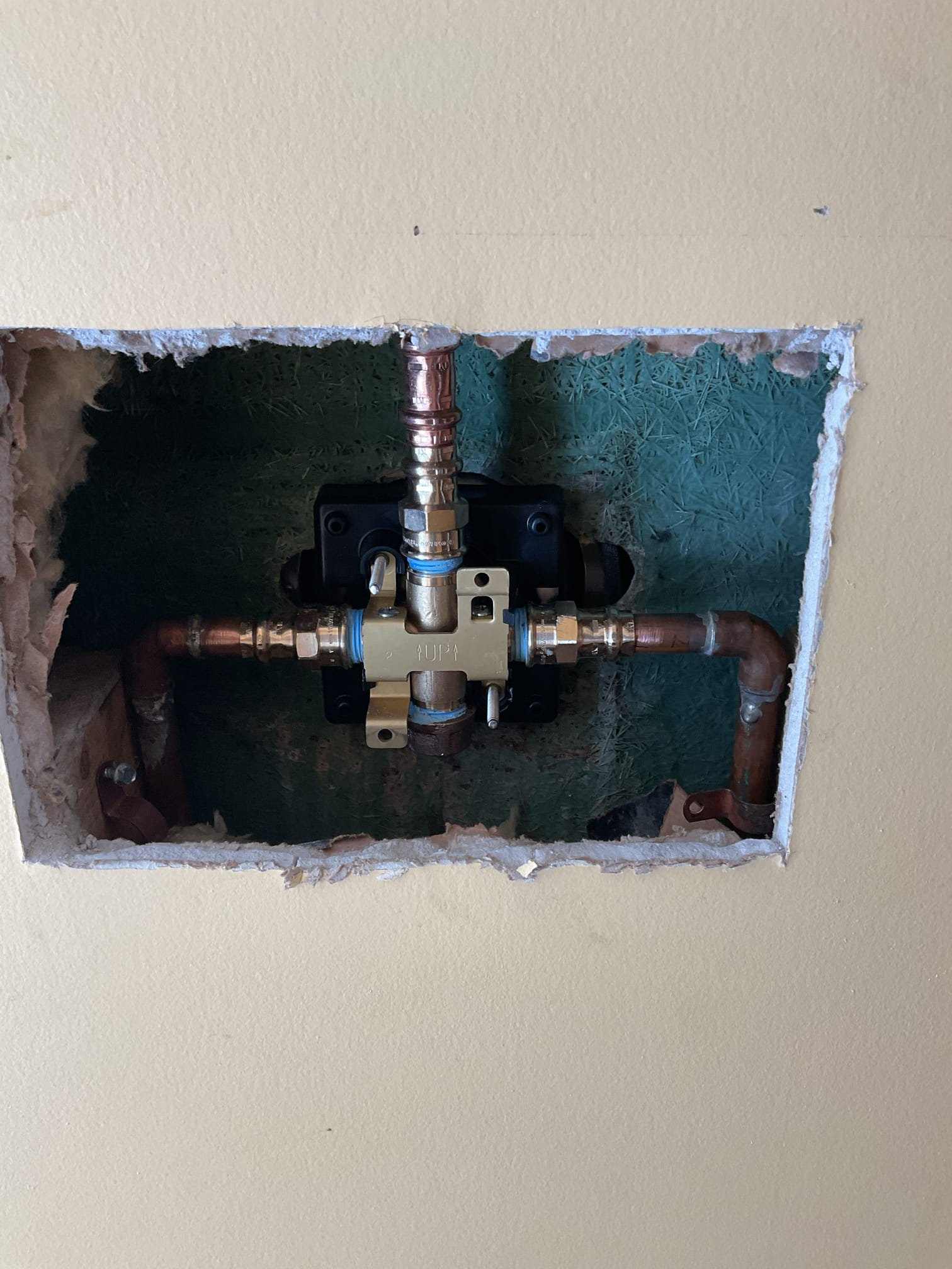 We removed the existing Symmons shower valve due to its ongoing leak and installed a new Delta shower valve to provide improved reliability and long-term performance. The wall was opened as needed to allow proper access, and the new valve was set in place with all required fittings, ensuring every connection was secured to current plumbing standards. After installation, the system was thoroughly tested to confirm proper operation and verify that the leak had been fully resolved. All work was completed in a clean, professional manner.