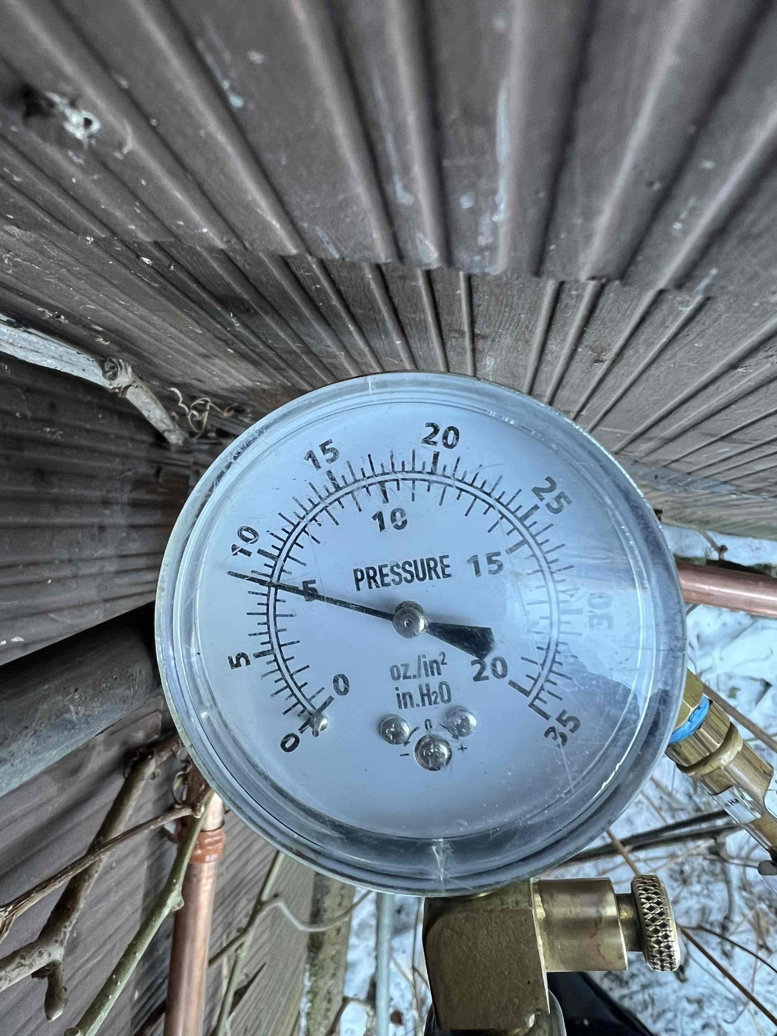 Arrived onsite to diagnose a possible gas leak on the water heater gas line in apartment #3. I had installed a Rinnai the previous day and noted a leak during our leak check that I suspected was coming from the existing water heater gas line. I performed a leak check on that line, and it held at 8.5 in/wc for 3 minutes with no pressure drop.

When I went down by the meter, I noticed a gas odor. I bubble-tested the meter and found a small leak. Since the meter is typically owned by the gas company, I advised Mr. Walthour to contact them for repair.