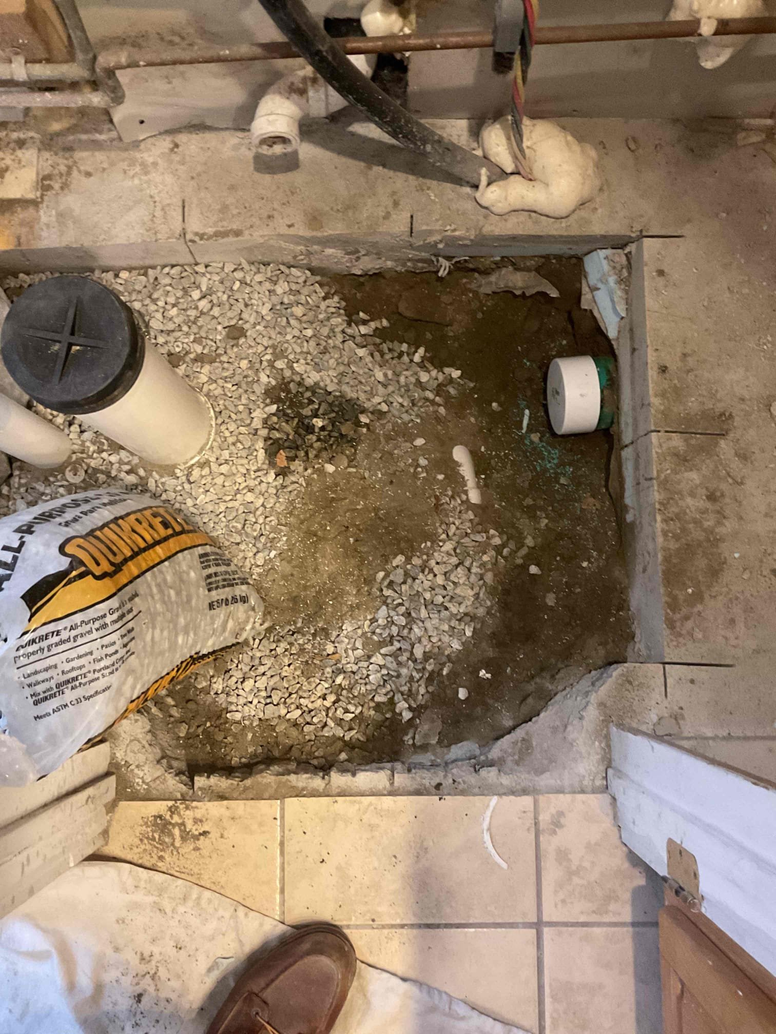 The home’s plumbing system shows signs of wear, including an aging pressure tank, water heater, and a leaking kitchen faucet. We propose replacing the 20-gallon well pressure tank, water heater, whole house sediment filter, rebuilding the Moen kitchen faucet and repiping the building drain to restore reliable water flow, improve efficiency, and prevent future leaks or failures.


11/19
-Disconnected, removed and disposed of the water heater.
-Cut the drainage stack above the floor to provide a space for the concrete contractors to cut the concrete
-The contractors cut and removed a 3’x2’ rectangle
-We are disposing of the concrete 
-The 4” pvc drainage is visible in the area of concrete that was removed 
-The concrete saw had cut through some of the pvc fittings that receive the waste from the first floor shower and toilet. These fittings will be replaced.
-Will return to remove the pvc fittings and dig through the soil to gain access to the frost wall to prepare for core drilling. 
11