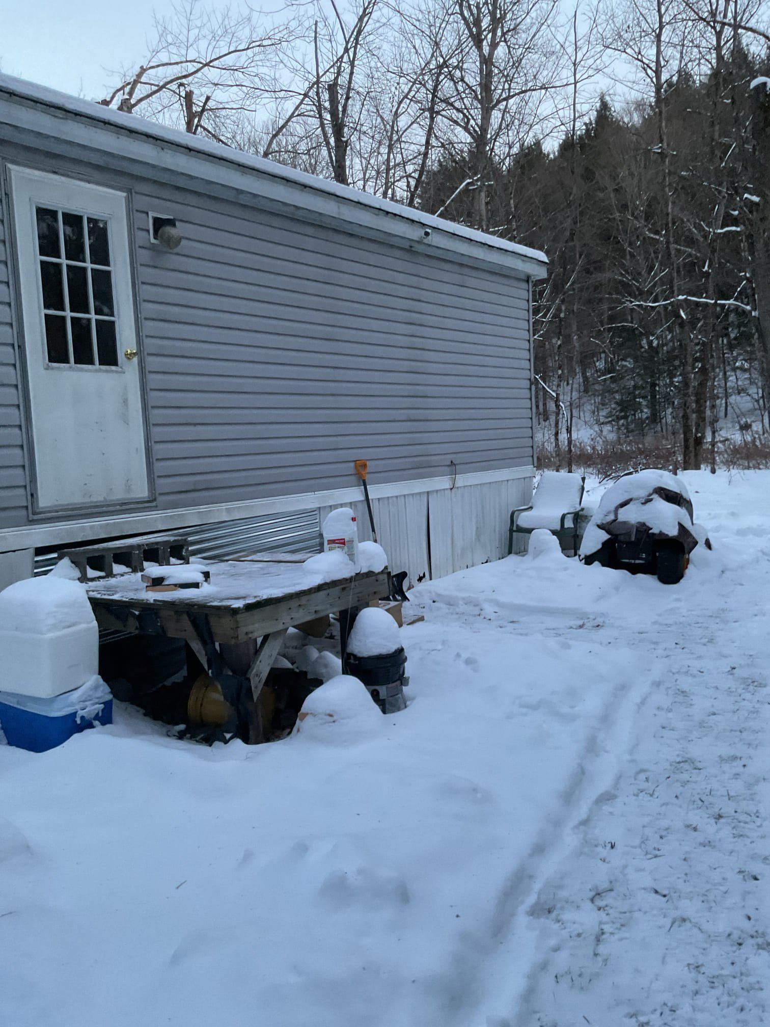 We came out to the property for a no-water situation and found that the well pump was drawing high but stable amperage, indicating that the motor was running but water was not moving. Based on these findings, we determined that the issue was most likely a blockage or frozen section within the water line rather than a pump failure. The customer planned to place heaters under the house to thaw the line and will inform us of the results. If water does not return after thawing efforts, replacement of the well pump will be necessary.