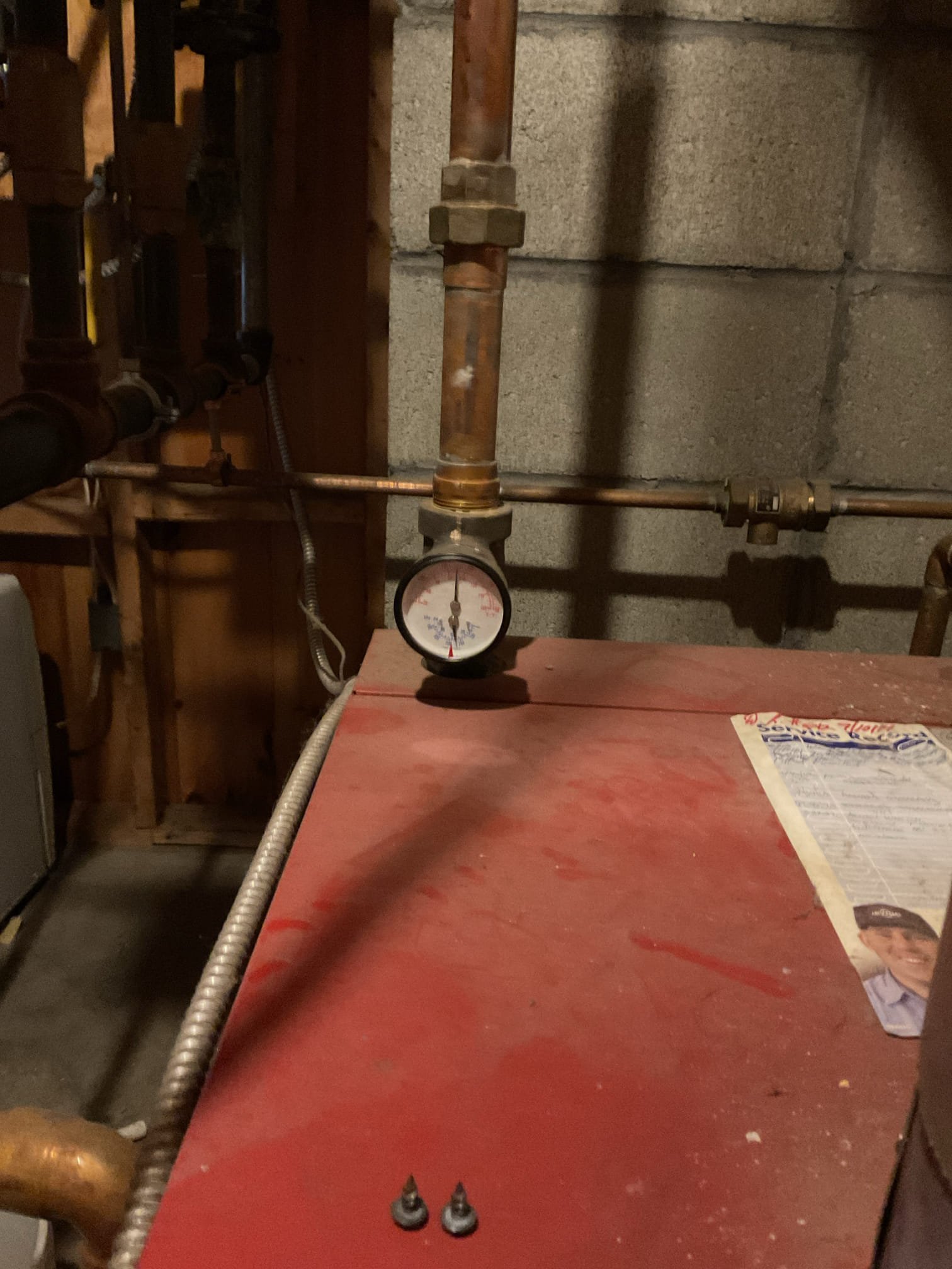 Arrived on site to diagnose no heat on propane boiler after an on call visit. After initial inspection we found that the pilot was lit but boiler would not fire. We found that the rollout switch was tripped. Reset it and boiler fired right up. We then cycled the boiler a few times to verify it was working properly. During one of the cycles, the pilot went out and we were unable to relight it. Removed pilot assembly and found that the thermocouple was loose. Pushed thermocouple back into assembly and relit. Stayed lit this time. 

Informed Zach that if this problem persists that the whole assembly will need to be replaced as the nut that was holding the thermocouple in place had melted inside the assembly and was not removeable without risking damage to the assembly itself.

As of now, the boiler is operating and heating zones properly.