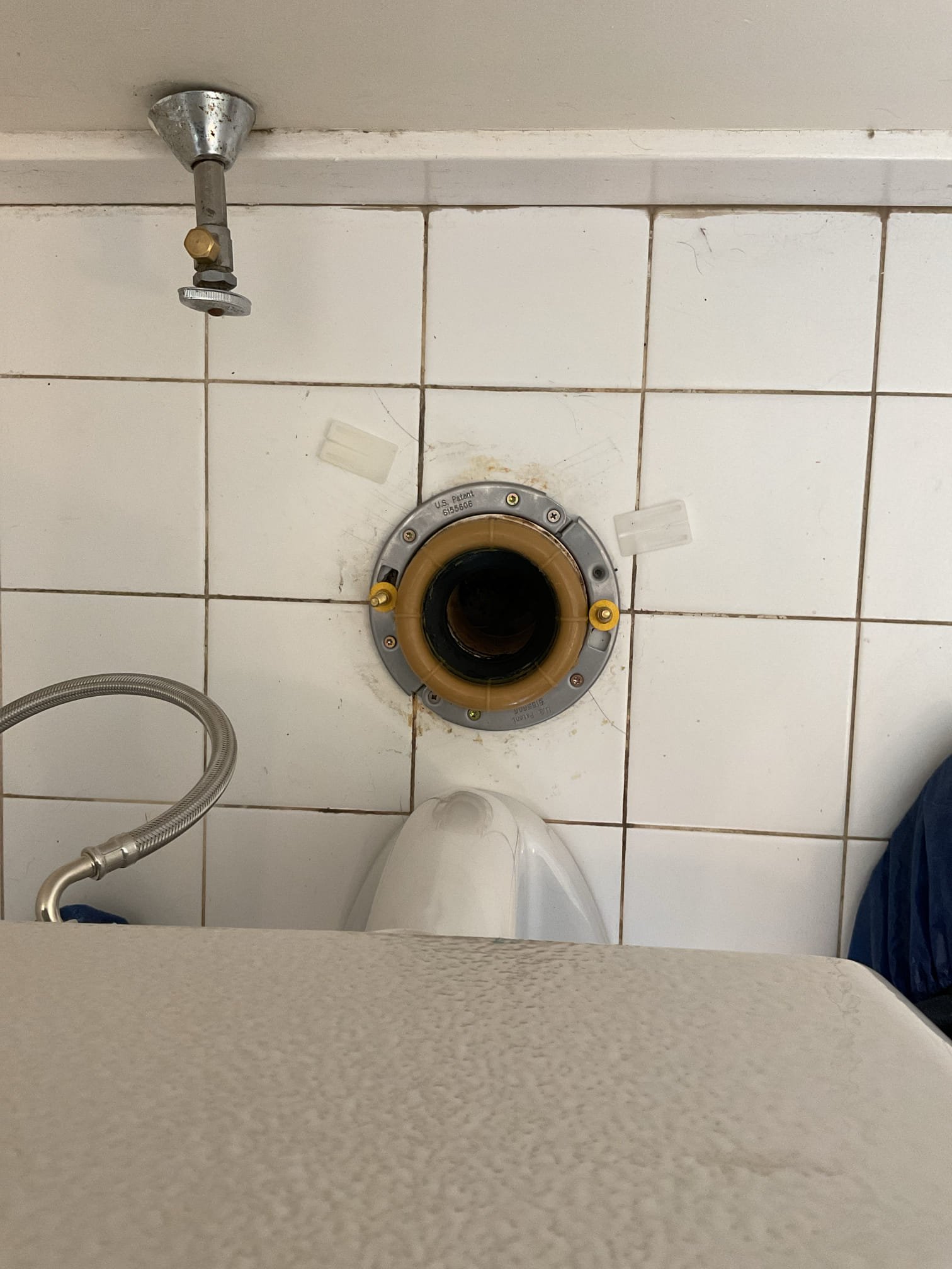 We found that the primary bathroom toilet was unstable at the base and in overall poor condition. We recommended replacing it with a new American Standard Cadet Pro toilet to restore proper function and ensure a secure, long-lasting installation.

The existing toilet was removed and properly disposed of. Upon inspection, the toilet flange was found to be deteriorated, which contributed to the rocking at the base. The damaged flange was removed and replaced with a new clam flange securely fastened to the floor. The shutoff valve was tested and confirmed to be operating correctly, so replacement was not necessary.

A new American Standard Cadet Pro white ADA-height toilet was installed using new closet bolts, a wax ring, and a new supply line. Per the homeowner’s request, the existing bidet seat was reinstalled. The water supply was restored and the system was tested, confirming proper operation with no leaks. A bead of caulk was applied around the base to enhance stability and improve e