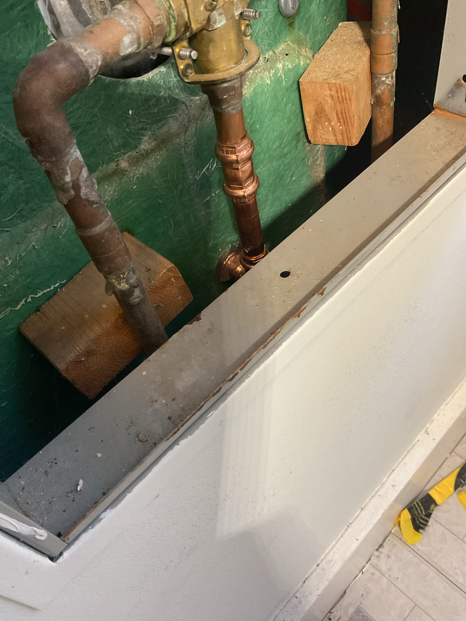 Water temperature was fluctuating from very hot to warm, the tub spout wasn’t properly sealing and the home lacked a reliable whole house shut off. So we replaced the tub spout, installed a mixing valve with checks, and installed a new ball valve on the main supply. All work was tested for proper function and no leaks  