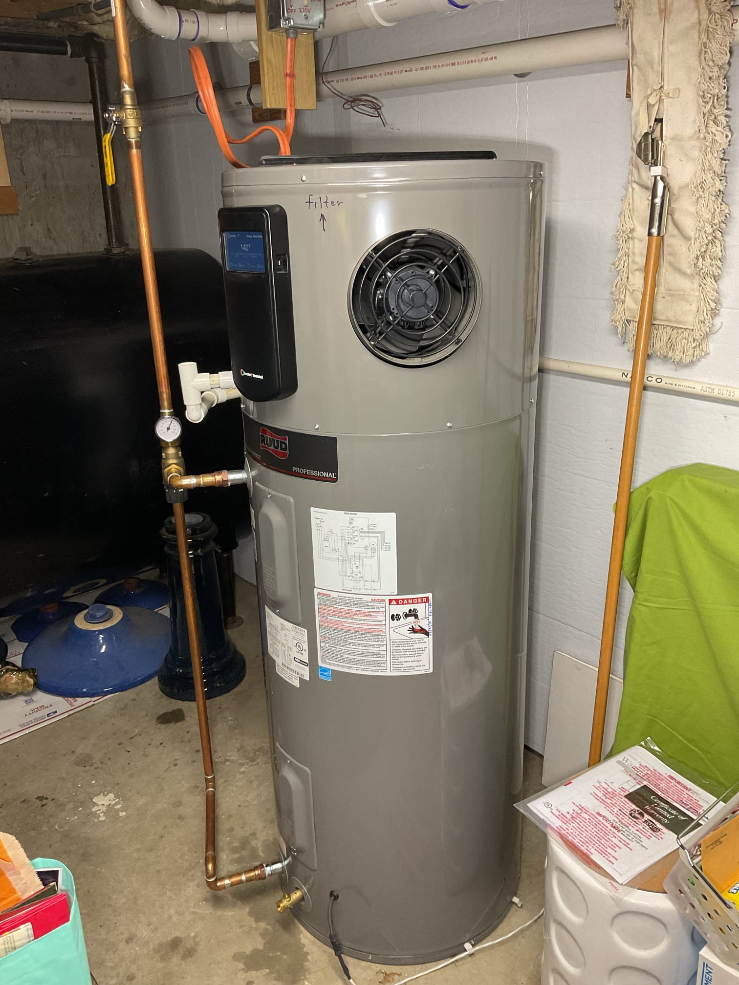 We found mildew buildup on the evaporator coil inside the heat pump water heater, caused by a lack of routine cleaning. We recommended a full coil cleaning to restore proper operation and improve system efficiency and air quality.
	•	Disconnected power to the hybrid water heater at both the breaker and the external disconnect, then removed the top cover of the unit.
	•	Applied coil cleaner to the evaporator coil to break down mildew buildup, then scrubbed remaining deposits with a brush for a deeper clean.
	•	Rinsed the coil with warm water to remove all residue and placed a drain pan tablet to help reduce future mildew growth.
	•	Tested the condensate drain line and confirmed proper flow with no blockages.
	•	Reinstalled the top cover and restored power to the unit.

After restarting, the unit displayed an error code indicating a clogged condensate line. I explained to the homeowner that this occurred because the drain pan sensor was temporarily activated by water used during cleaning