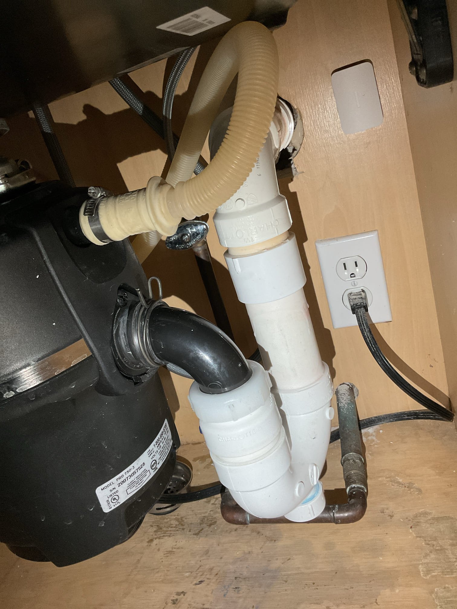 For this job, we spun and properly realigned the garbage disposal to match the new sink configuration. We removed the existing accordion-style trap, which was not up to plumbing standards, and installed a new, correctly sized trap assembly to ensure proper drainage. In addition, we added a clean-out to provide easier access for future maintenance and to improve overall system reliability. All work was completed to current plumbing codes and tested to verify proper operation upon completion. This is a temporary solution until a more permanent fix can be completed.