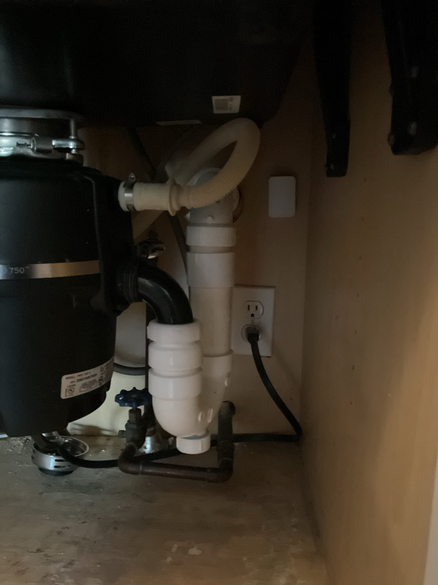 For this job, we spun and properly realigned the garbage disposal to match the new sink configuration. We removed the existing accordion-style trap, which was not up to plumbing standards, and installed a new, correctly sized trap assembly to ensure proper drainage. In addition, we added a clean-out to provide easier access for future maintenance and to improve overall system reliability. All work was completed to current plumbing codes and tested to verify proper operation upon completion. This is a temporary solution until a more permanent fix can be completed.